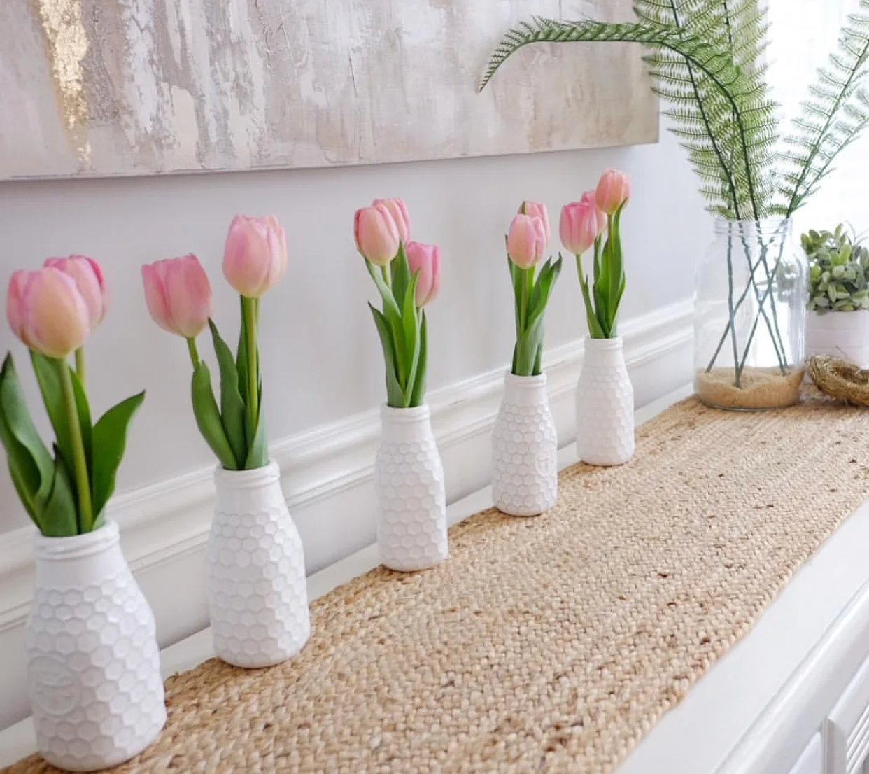 Tulips in individual vases make a great Spring statement piece!