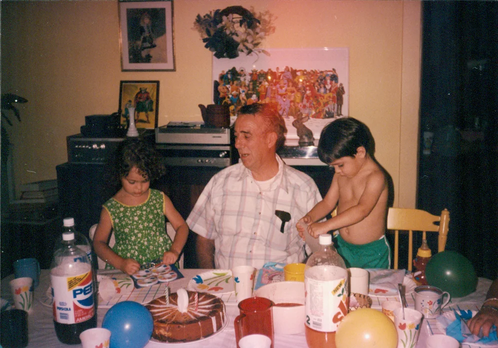Little me, one of my brothers, and our maternal grandfather circa 1988.