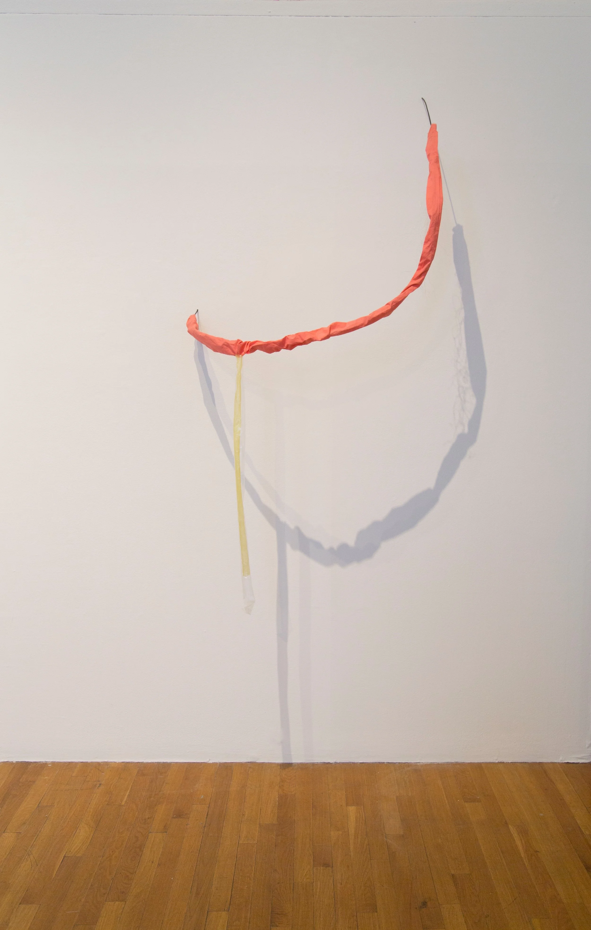 Downward dangles, 2016. Cloth, steel wire, thread, plastic, 36 x 65 inches.