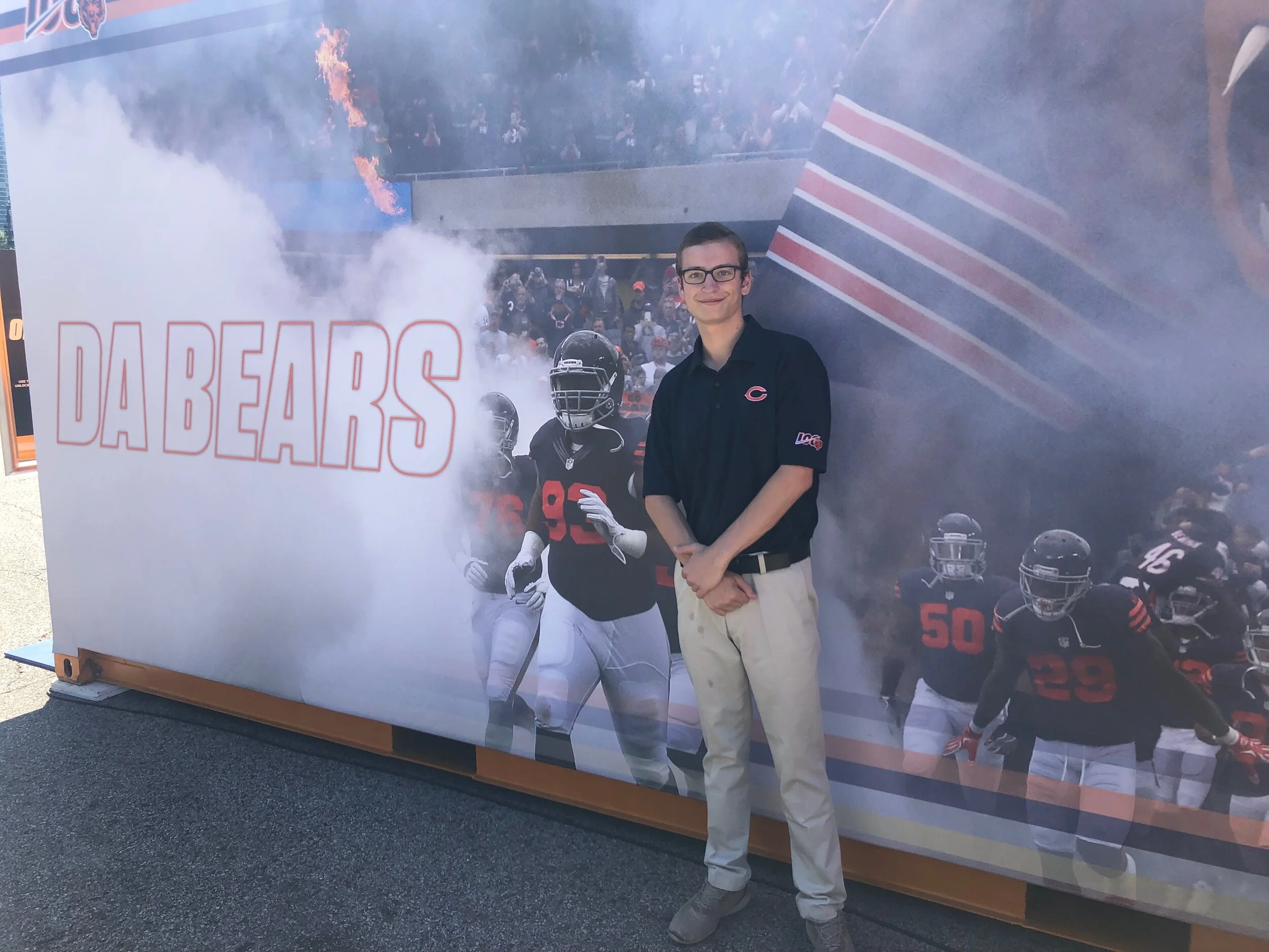 Dressed in game day work attire, Sean poses for a pic at Soldier Field, home of the Chicago Bears