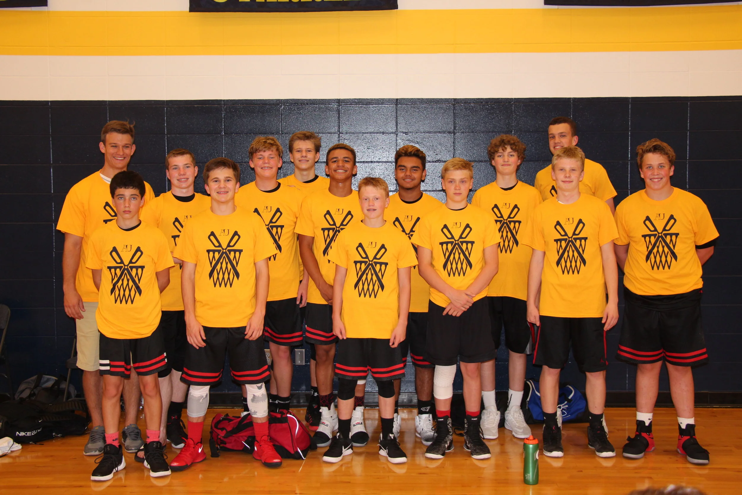 The freshmen team modeling their Augustana championship shirts.