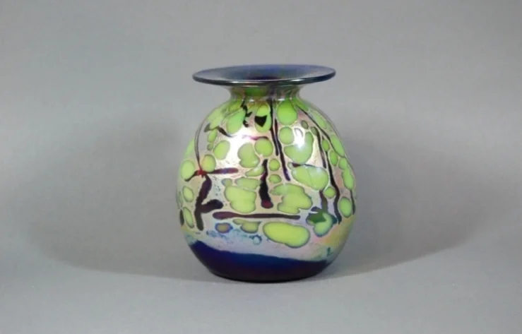 Cobalt vase with green frit and black cane.