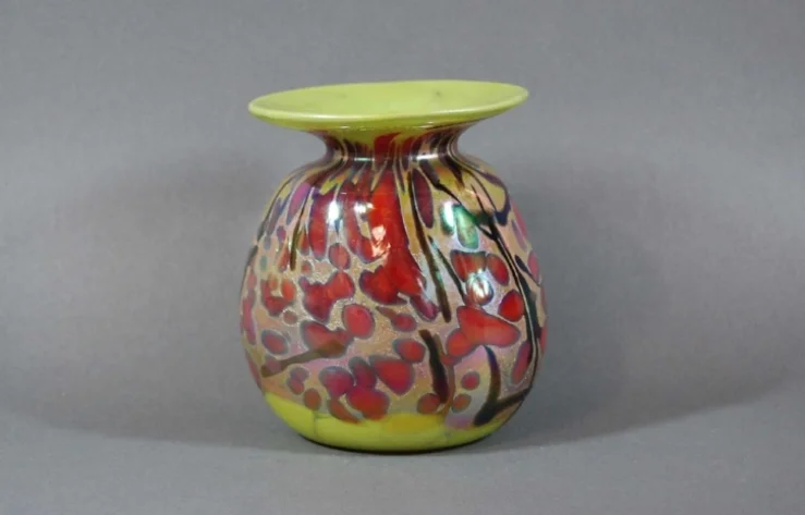 Lime vase with red frit.