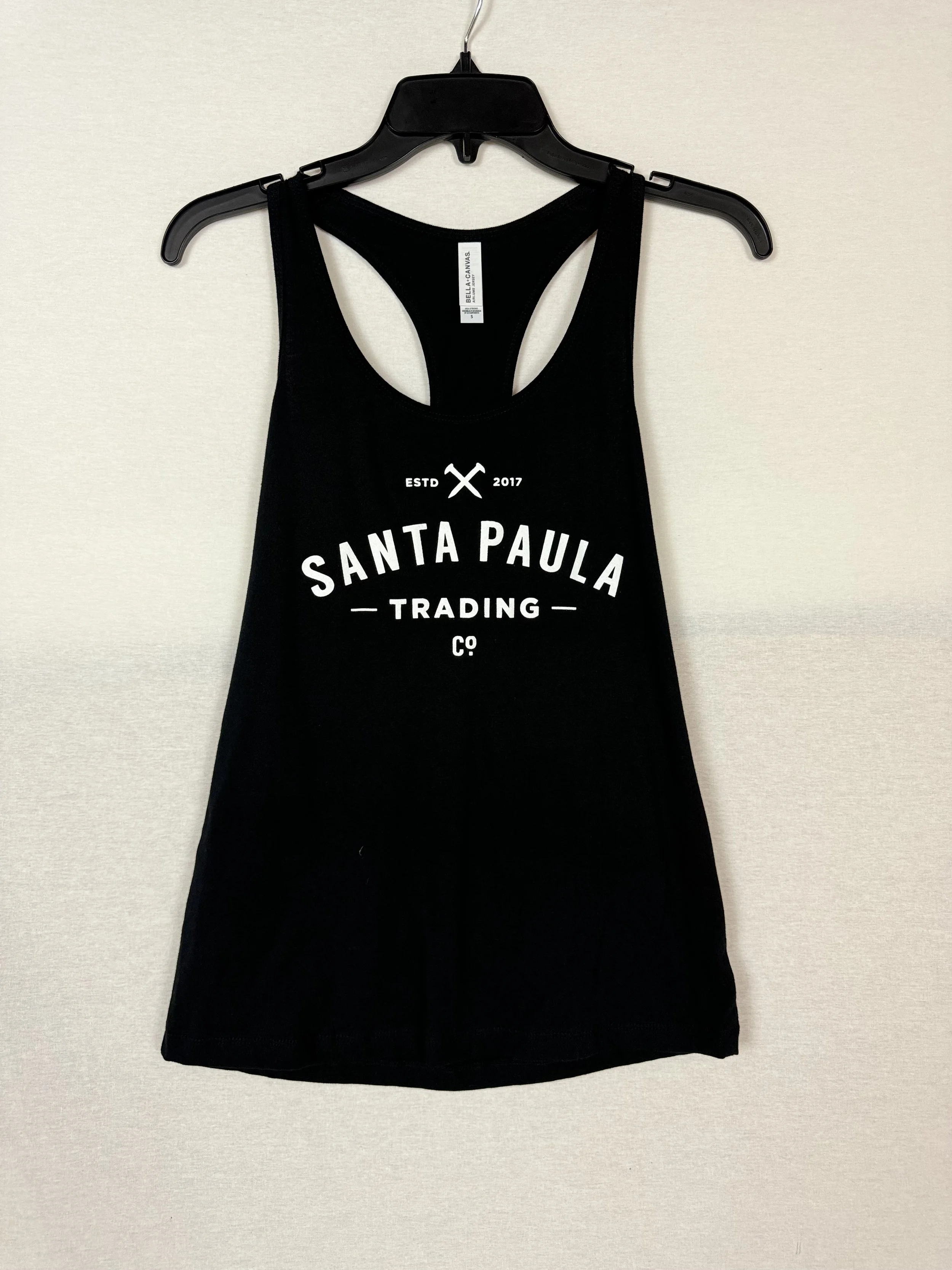 Santa Paula Trading Co women's racerback tank front view with full logo in Black