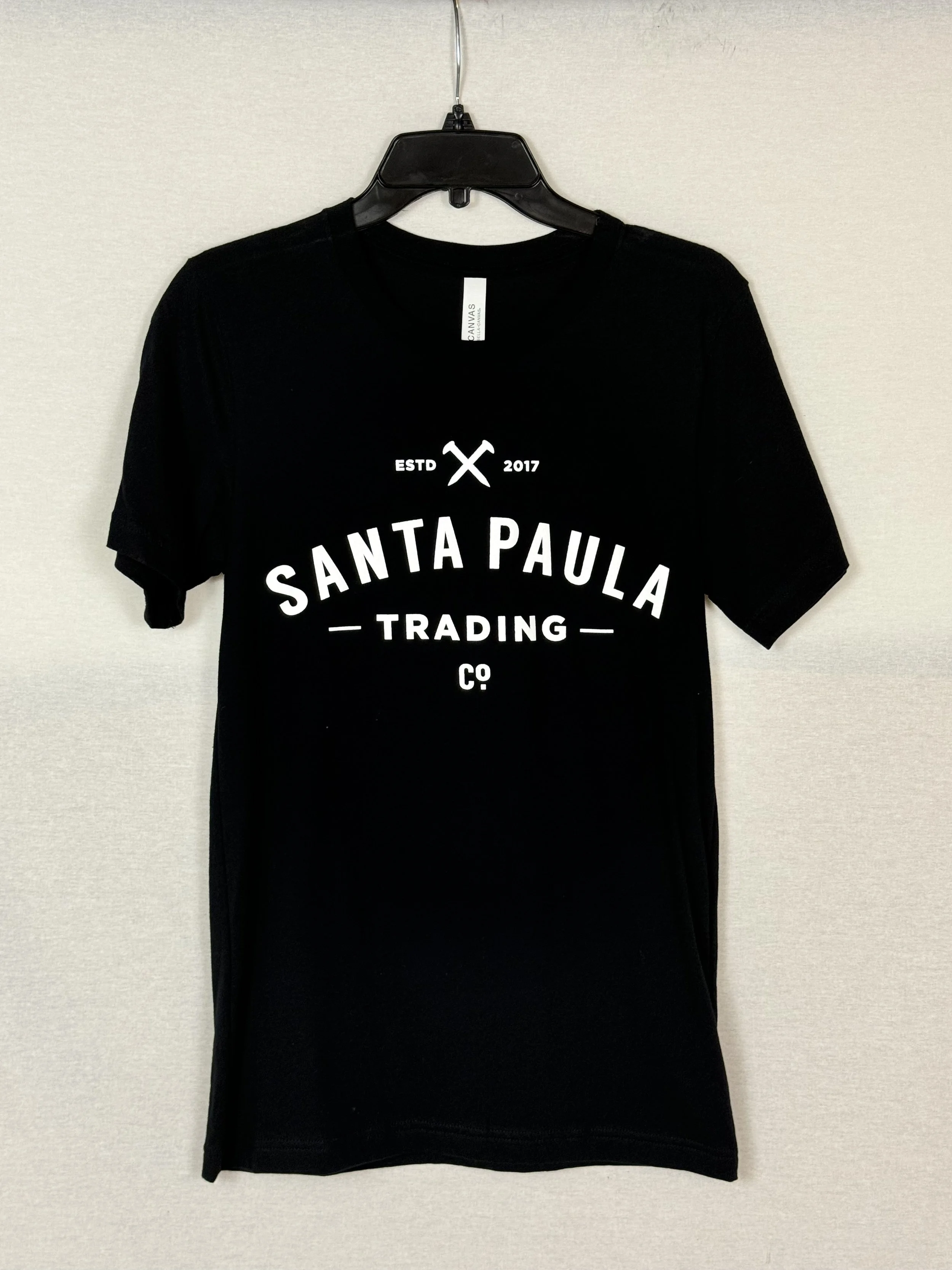 Santa Paula Trading Company unisex Tshirt front view with full SPTC logo on front chest in Black