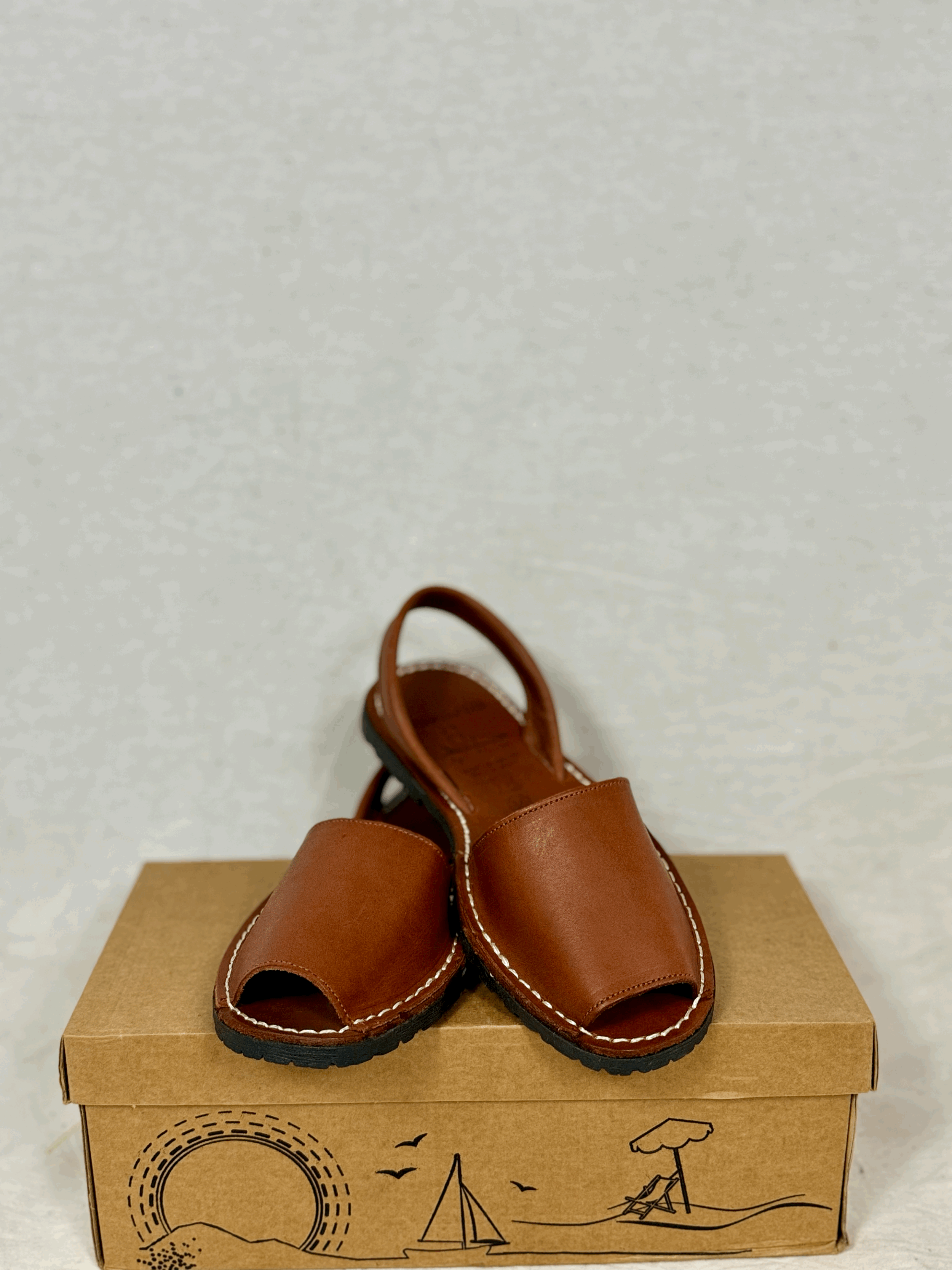 AVARCA Leather sandals in Cuero brown raw leather.