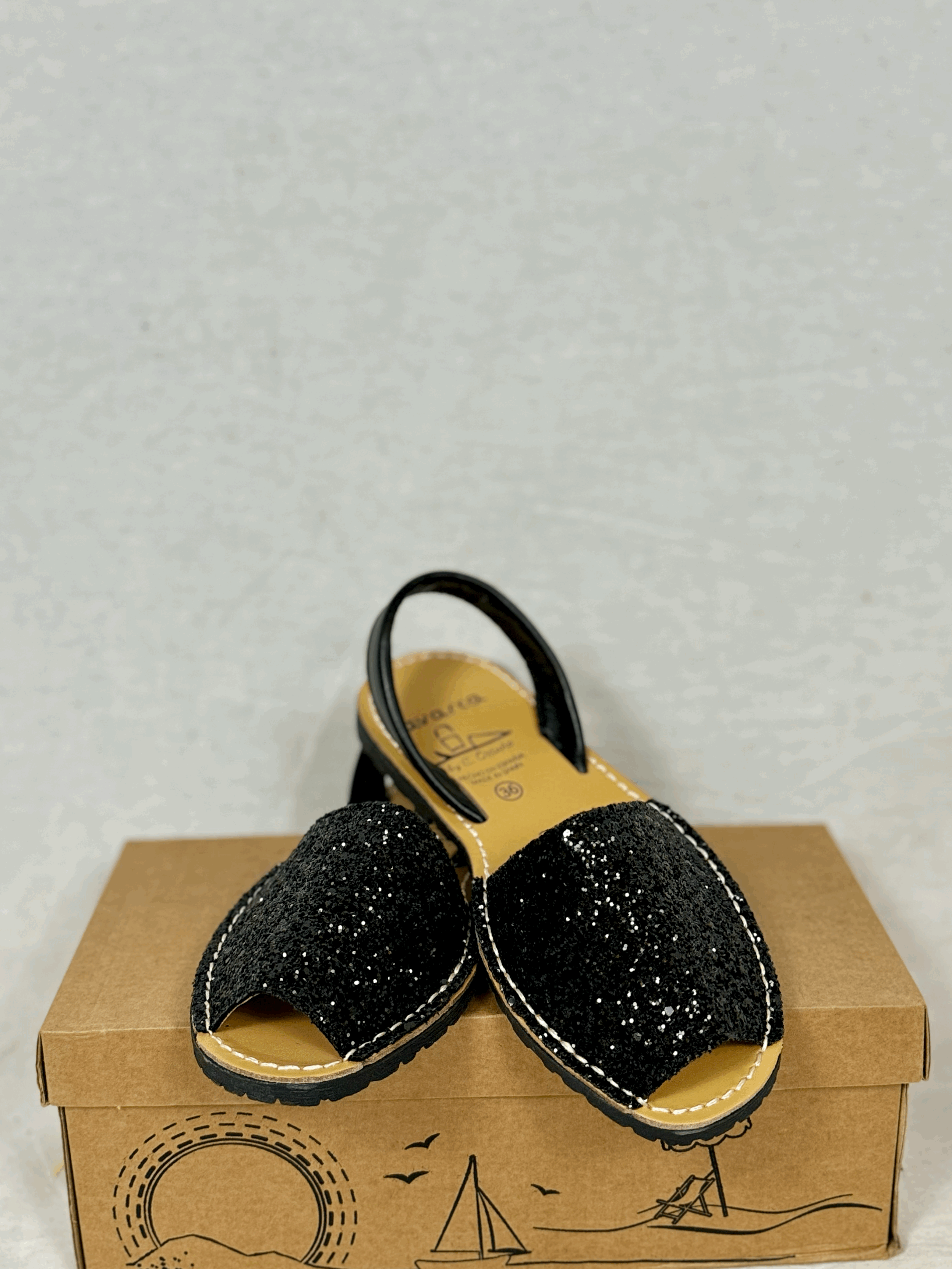 AVARCA Leather sandals in sparkle black.