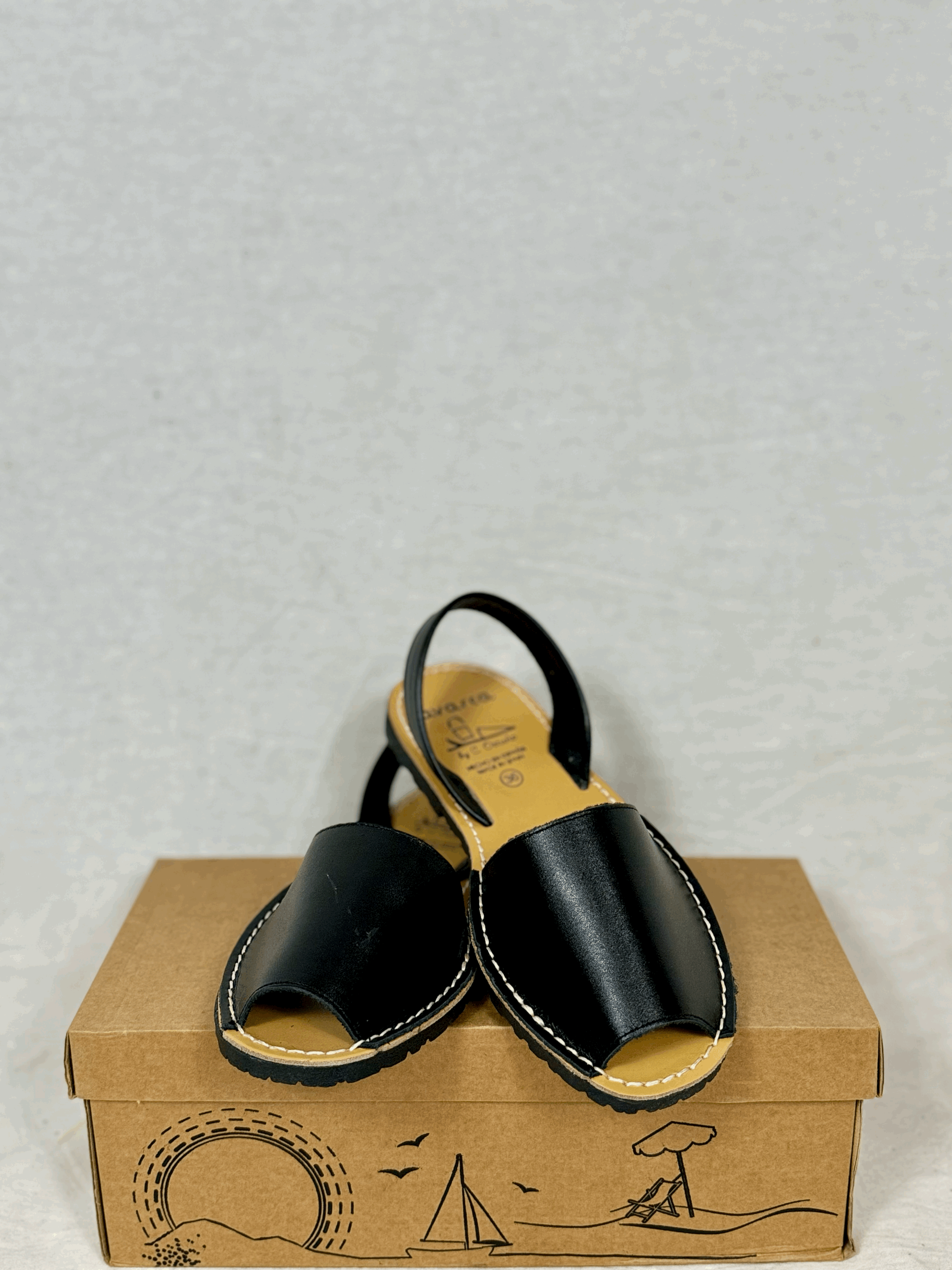 AVARCA Leather sandals in Black treated leather