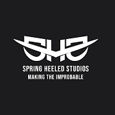 Spring Heeled Studios logo with stylized text and the tagline 'Making the Improbable' on a black background.