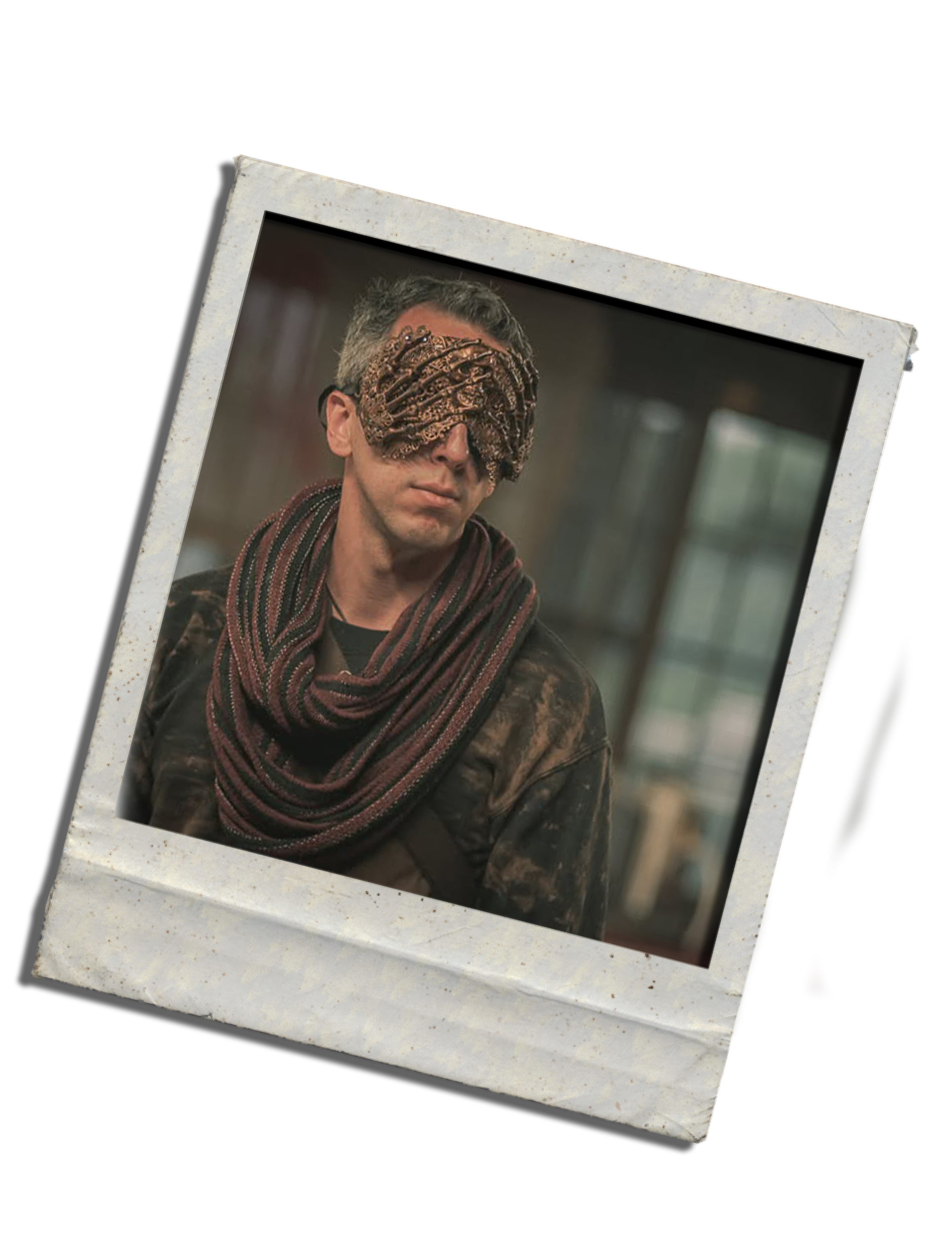 A photograph of a man with gray hair wearing a scarf, with a creature resembling a large, brown, tentacled face covering his eyes.