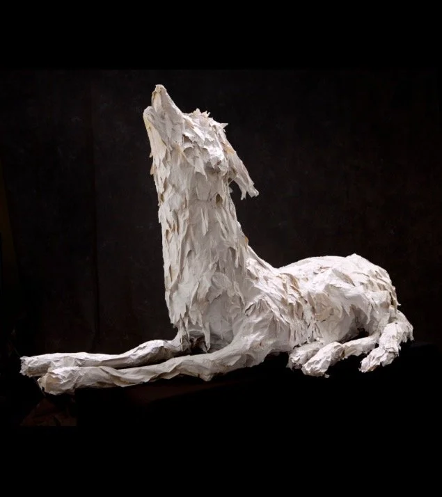 Rachel_Gardner_Laying Howling Wolf Sculpture.jpg