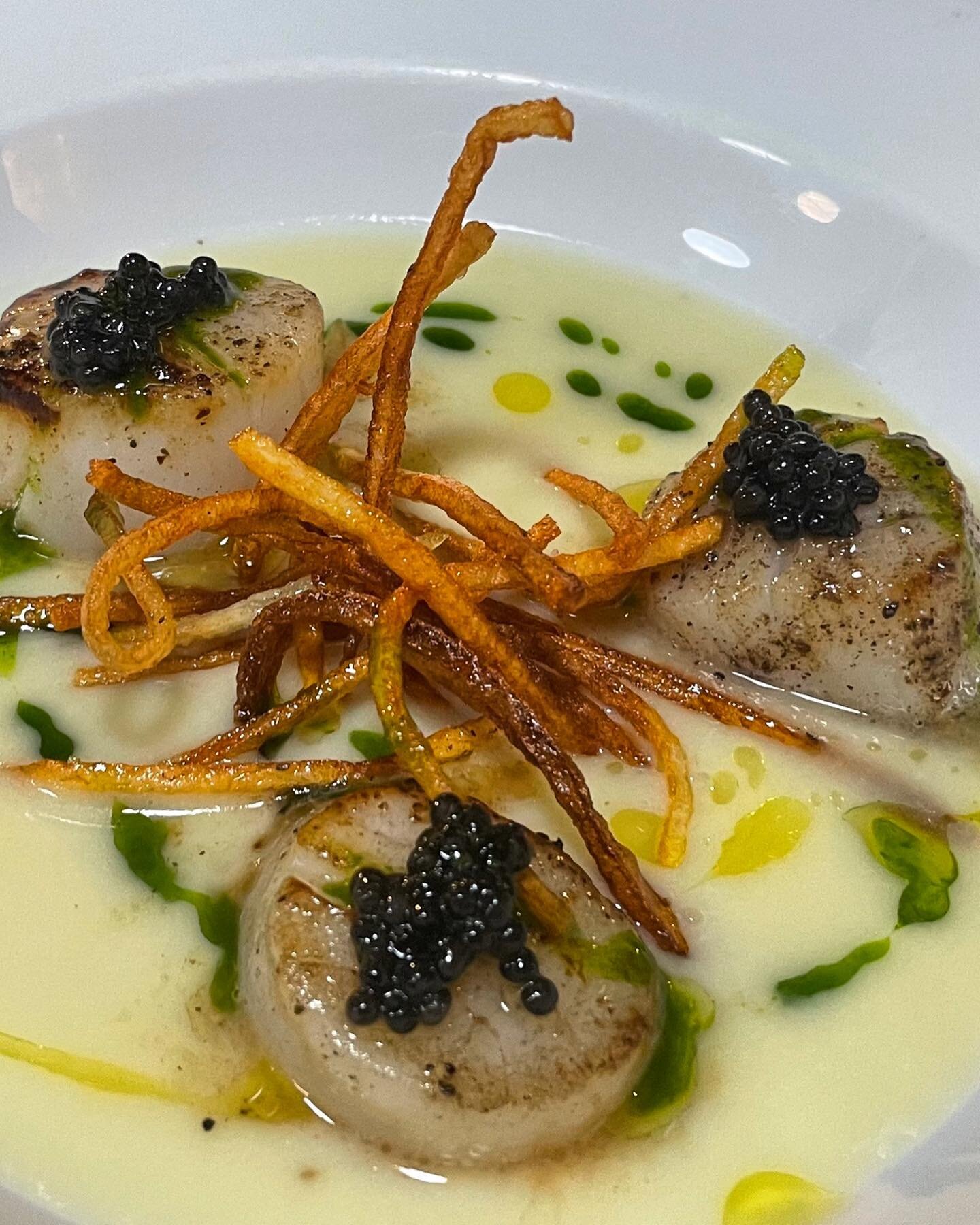 First love&hellip;scallops-vichyssoise, northern divine caviar, truffle, chervil oil &amp; straw potatoes