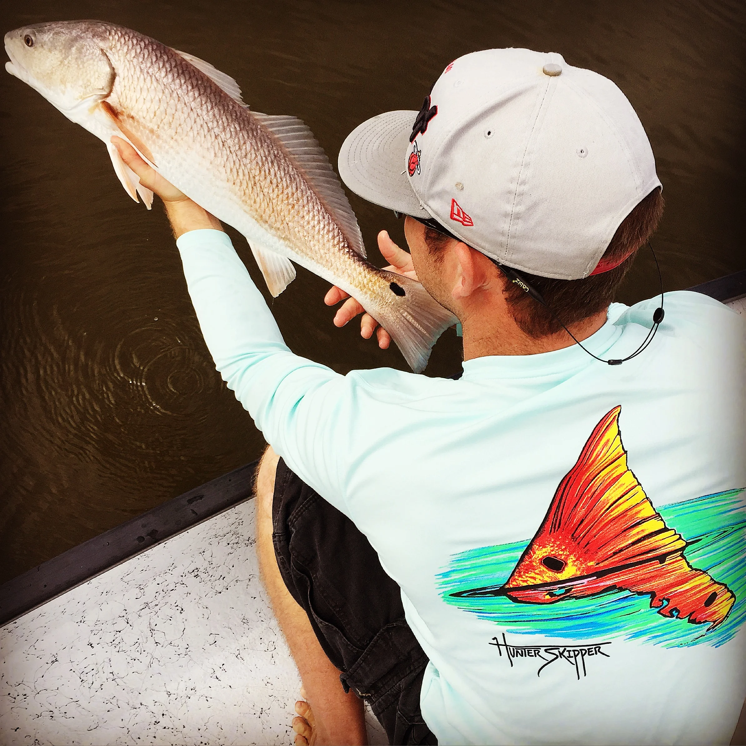 Releasing a Beautiful Indian River Redfish.