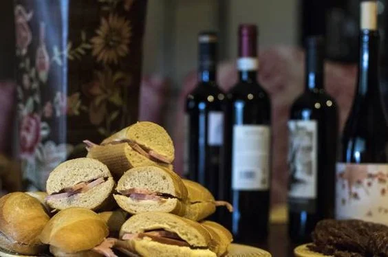 A classic French lunch: Ham and butter sandwiches and French wine
