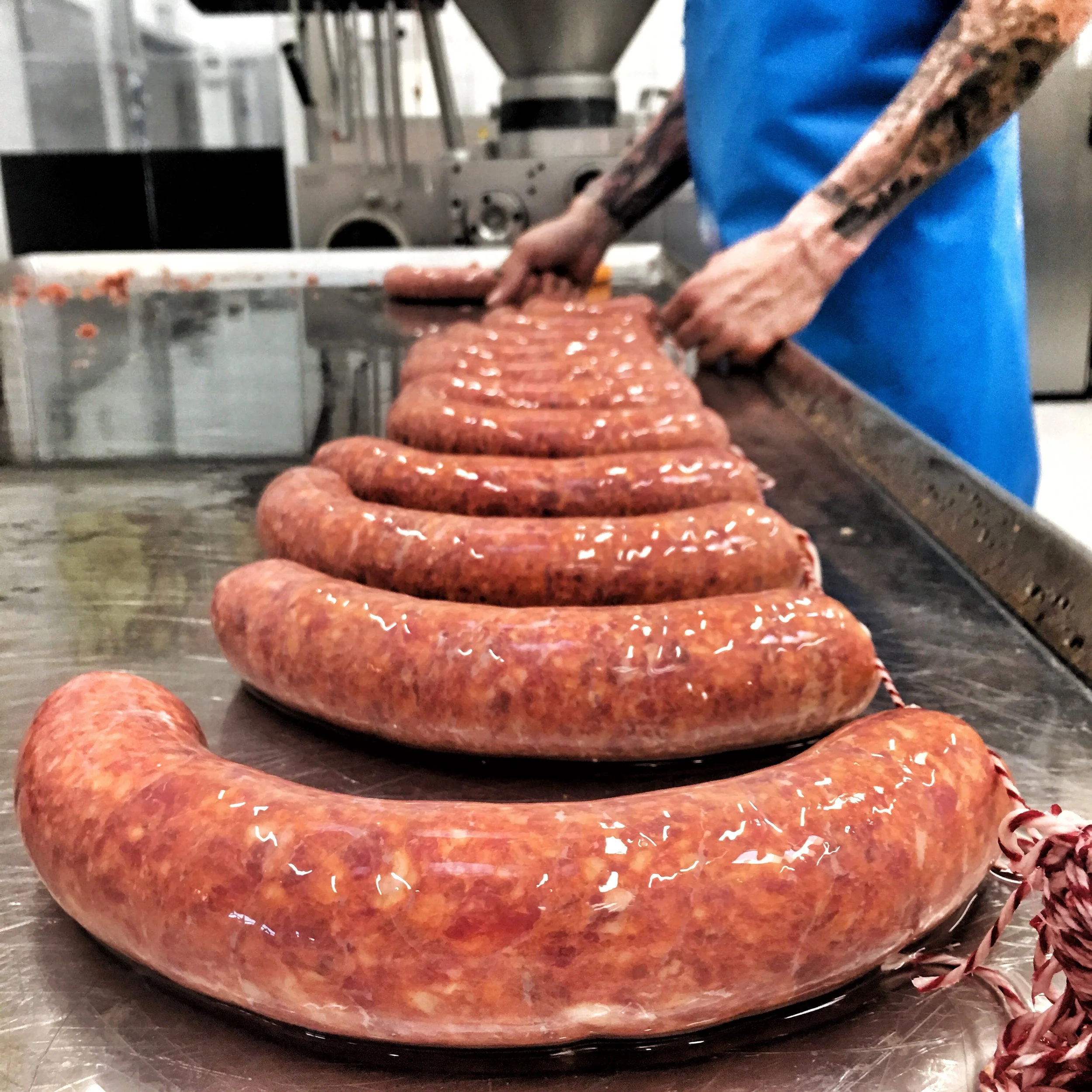 Salami production in the processing facility.