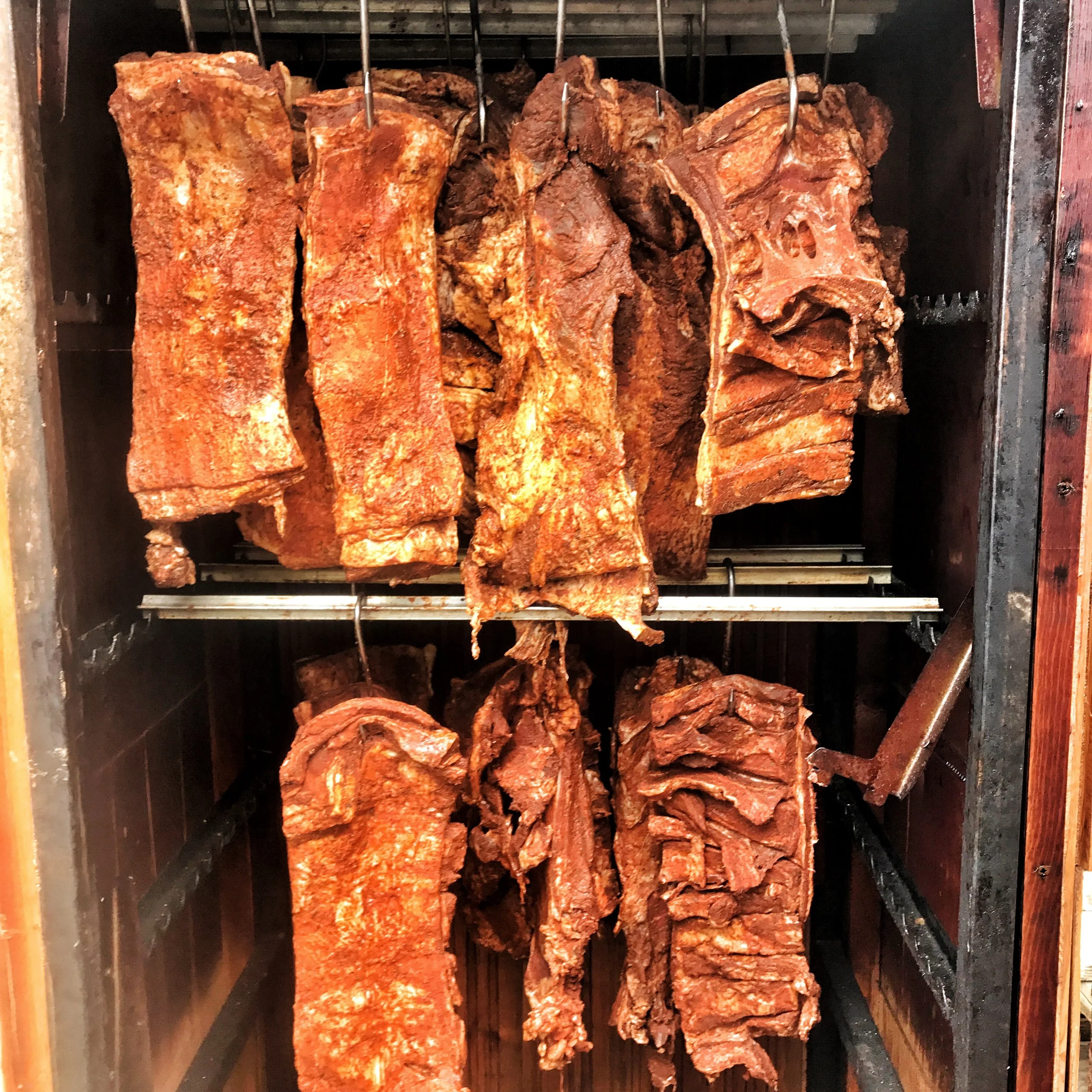 Danish BBQ hanging in the cold smoker.