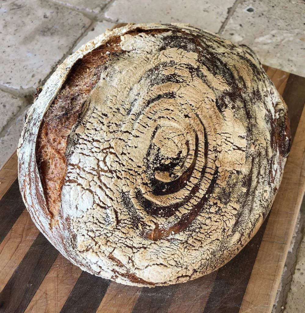 When I'm home, I'm under constant attack - everybody wants me to make bread! To fend off the hungry hordes, I made a few batches of bread. I was quite proud of this fella - turned out to be a beaut.