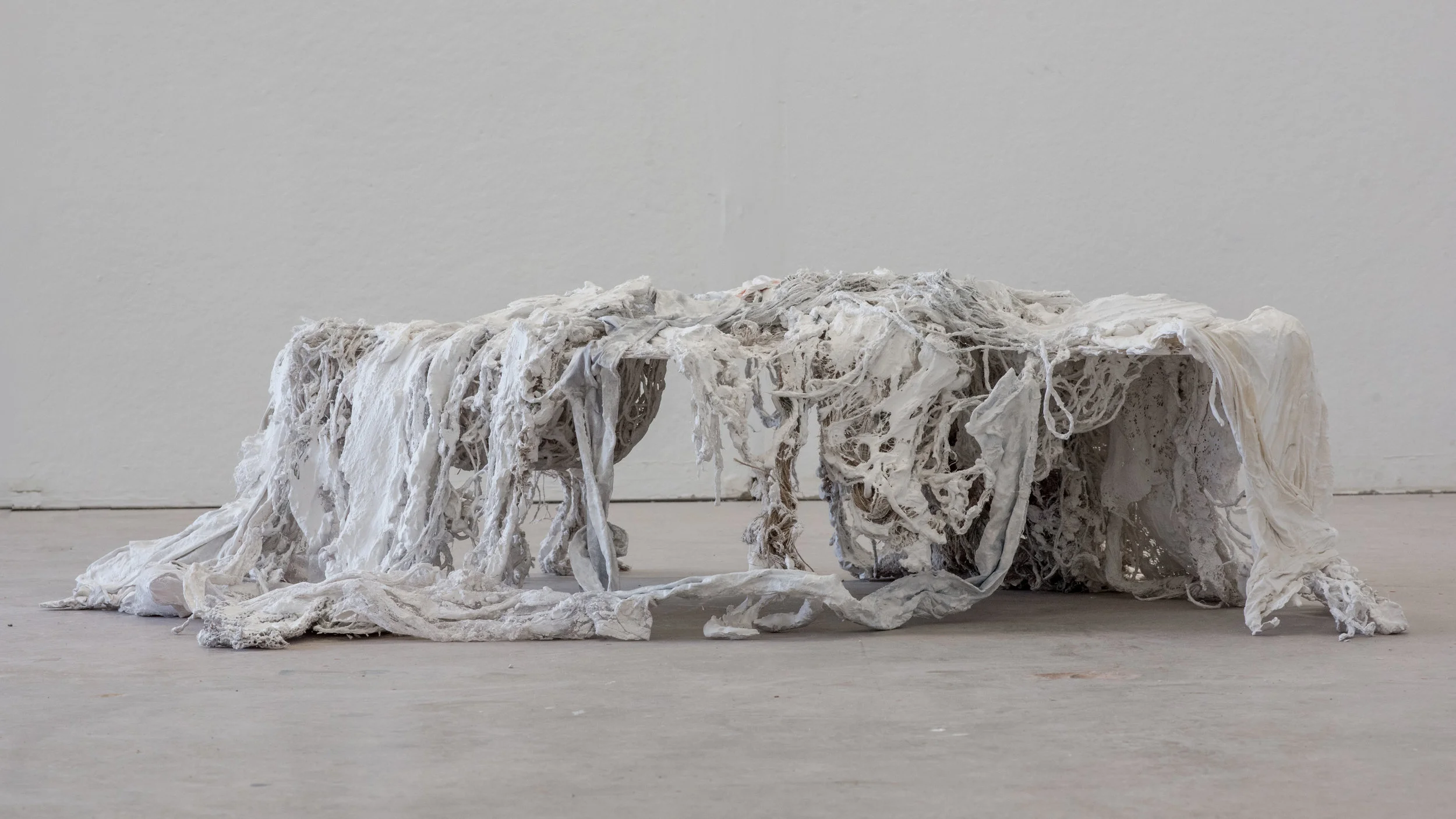  2017  /  hydrocal plaster, collected fabric, acrylic paint  /  47.5” x 30” x  32”  