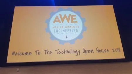 Three large screens displayed the AWE logo to welcome everyone.