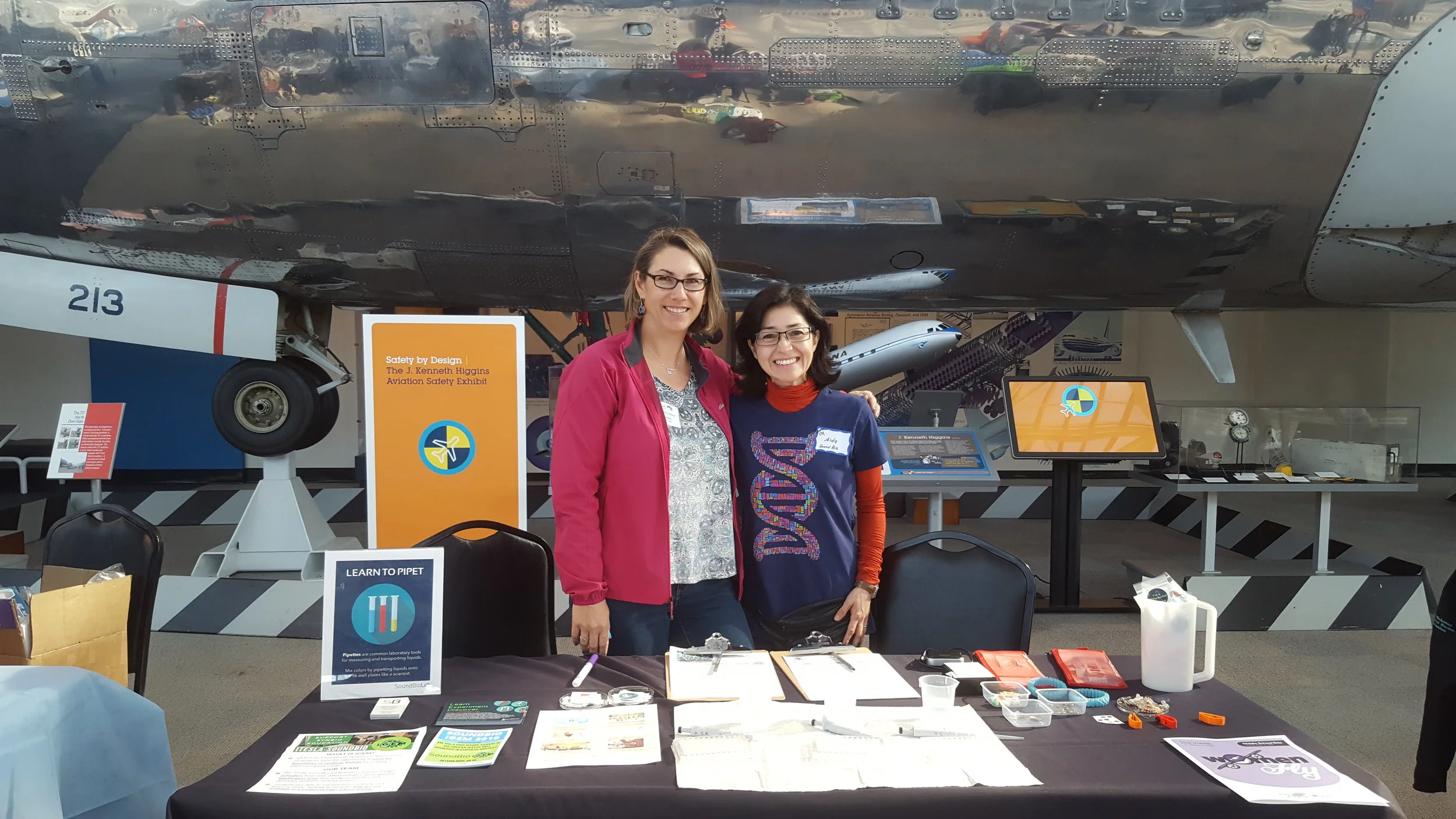 Our booth featured pipetting and our microscope clips.
