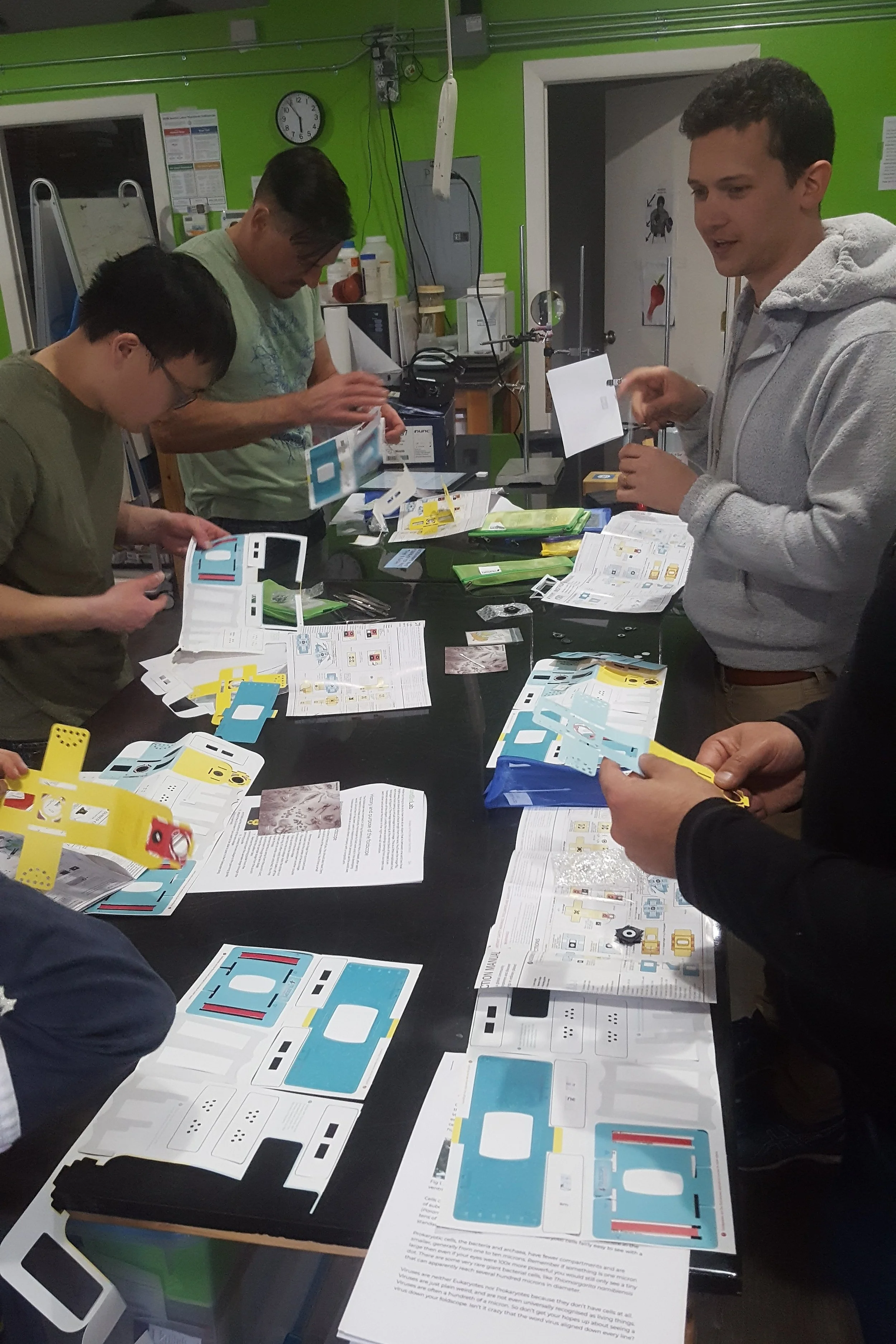 Building Foldscope Microscopes in the lab.
