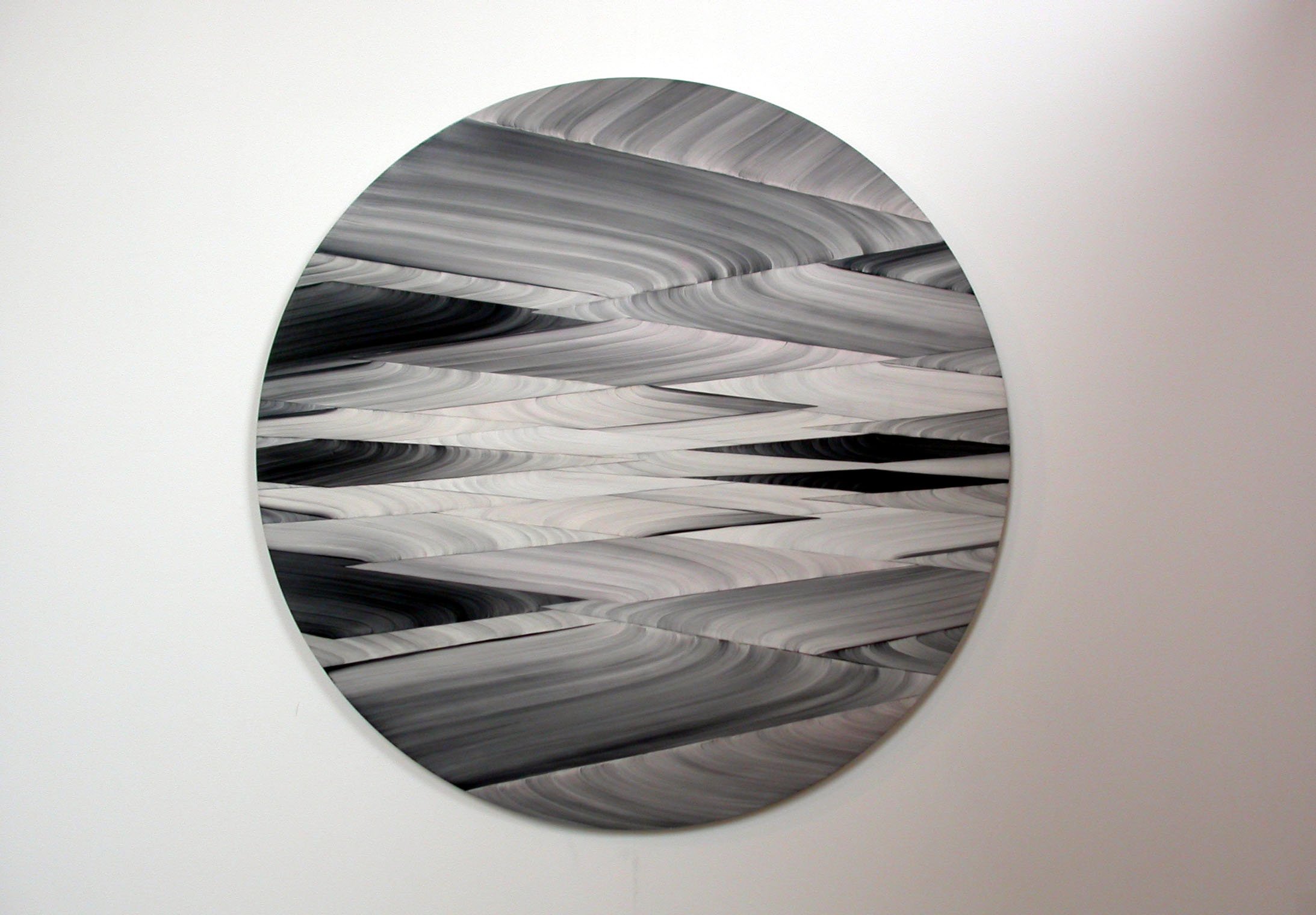  Image of one of two identical circular oil paintings hanging on the gallery wall. 