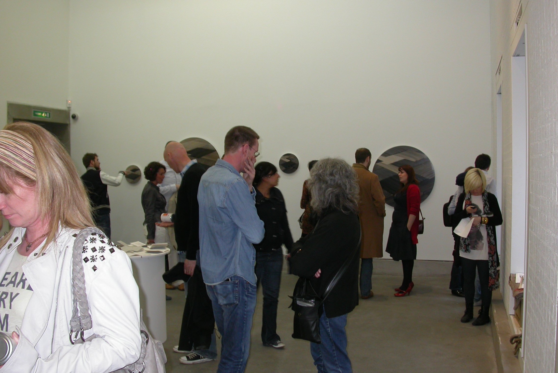  Image of a group visitors in one of the Bluecoat galleries on the opening night of Global Studios, 2010. 