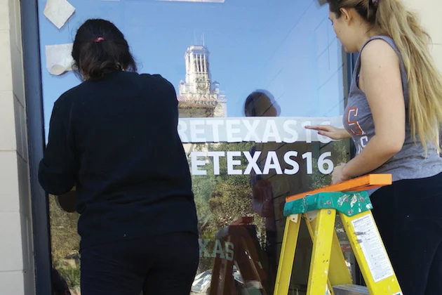 Textiles and apparel students design displays for the windows of the University Co-op.