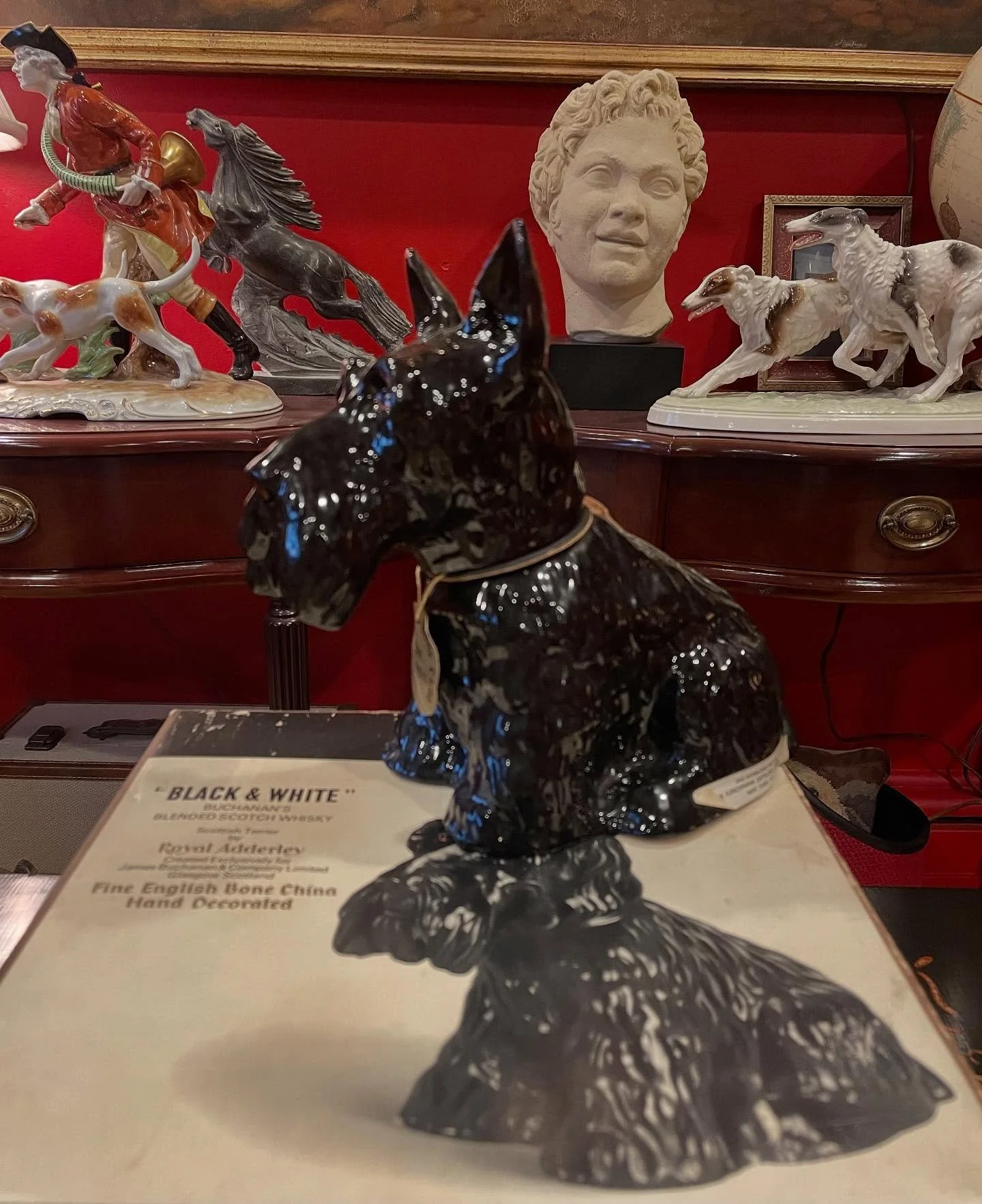 Red Jacket Scotty.
Today is a good day to focus on things that make me happy. My latest acquisition from the fine folks at Grey Barn Antiques in Andover is this Scotty Dog whisky decanter made in Glasgow, Scotland by Royal Adderley for the James Buch