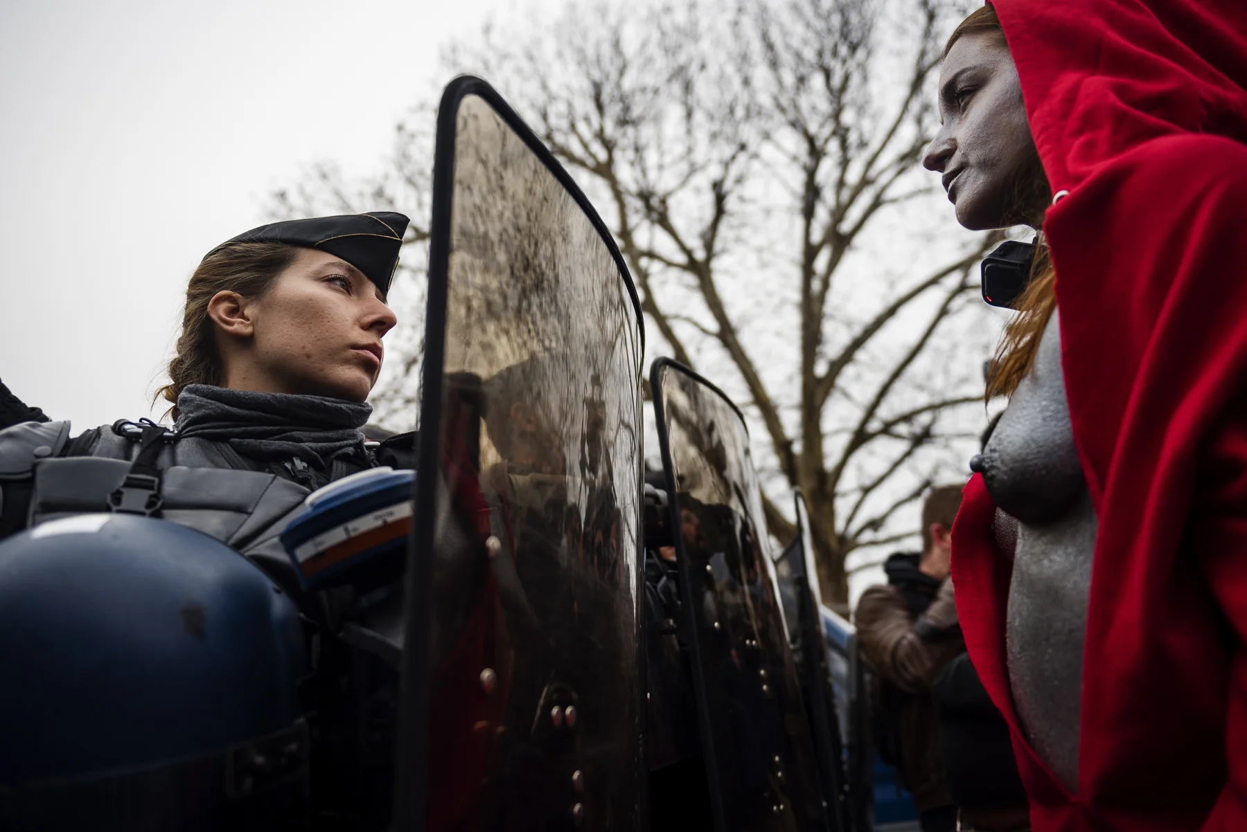 Women dressed as the 'Marianne', the national symbol of the French Republic, face French Gendarmes in the Champs Elysees Avenue in Paris, on December 15, 2018, as they take part in a demonstration called by the 'Gilets Jaunes' ('Yellow Vest') to protest against rising costs of living they blame on high taxes. Despite French government ministers appeals to the nationwide 'Gilets Jaunes' ('Yellow Vest') protests to stop in the wake of the Strasbourg attack that killed three people on December 11, protesters took the streets of France for the fifth consecutive Saturday. The 'Gilets Jaunes' ('Yellow Vest') movement - began on November 17, 2018 and inspired by opposition to a new fuel tax - has absorbed a wide range of anti-government sentiment and wrecked Paris and other French cities for over a month.