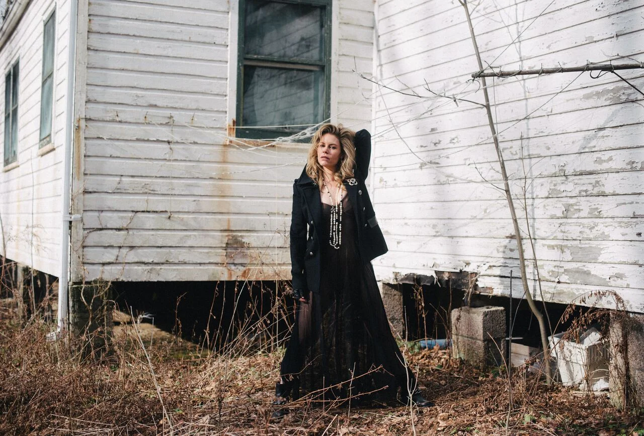 Photography: Steve Otte | Wearing: Norma Kamali dress | barbara bui coat | Chanel pins and necklace | giuseppe zanotti boots