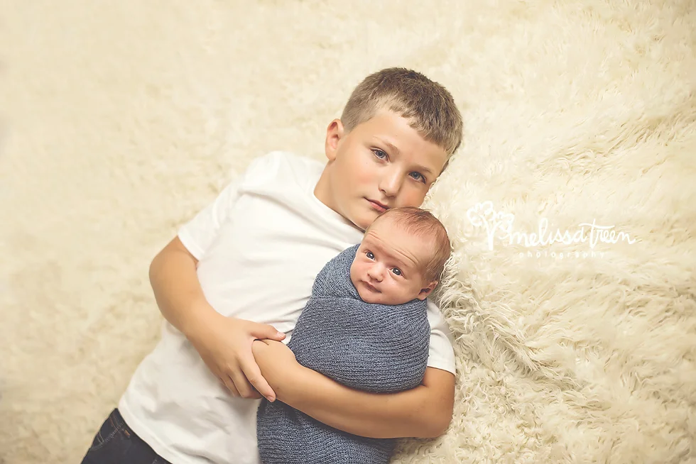 sibling photos new baby with brother pictures greensboro nc photographer.jpg