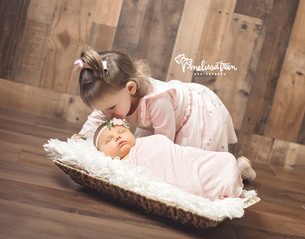 sister and baby photos greensboro newborn photographer.jpg