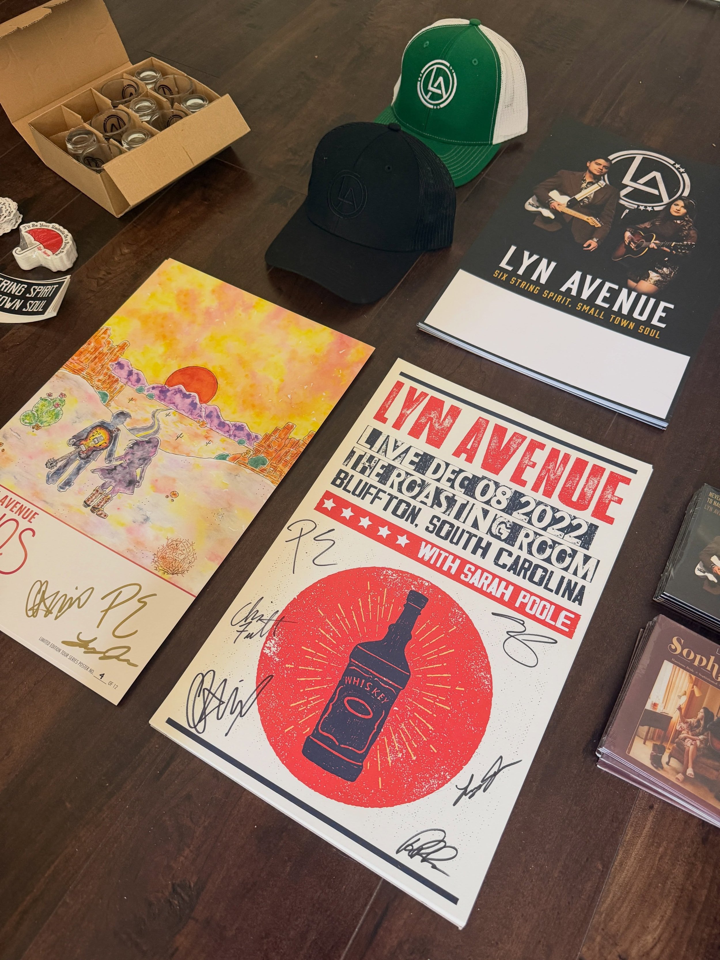 I&rsquo;ve uncovered a handful of shirts, tanks, hats, coozies, posters, CDs, stickers, and other pieces of Lyn Avenue history&mdash;some of which have been packed away for years.  Rather than letting these things sit in boxes, I&rsquo;d love for the