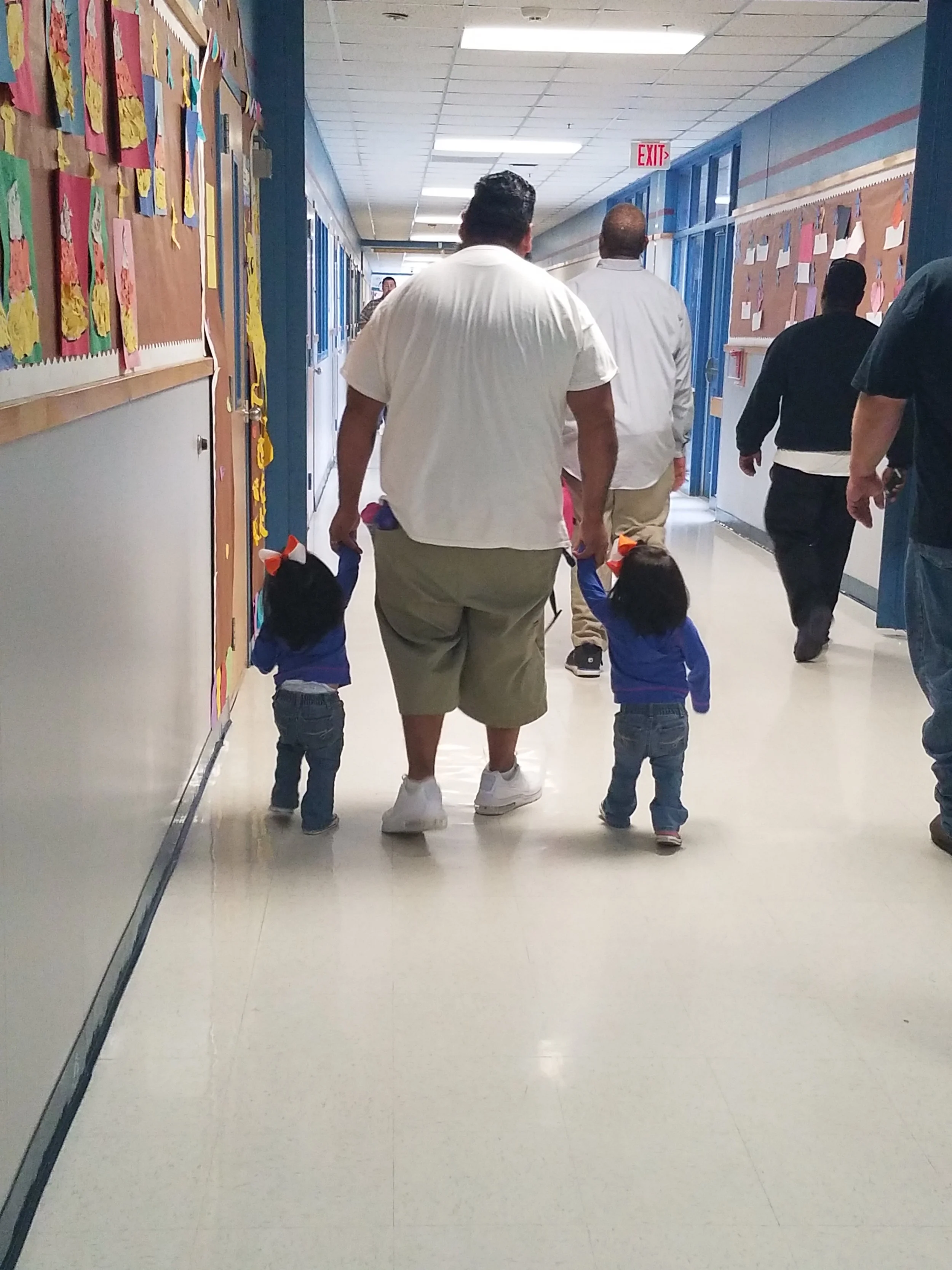 BIG Dad with little girls.jpeg