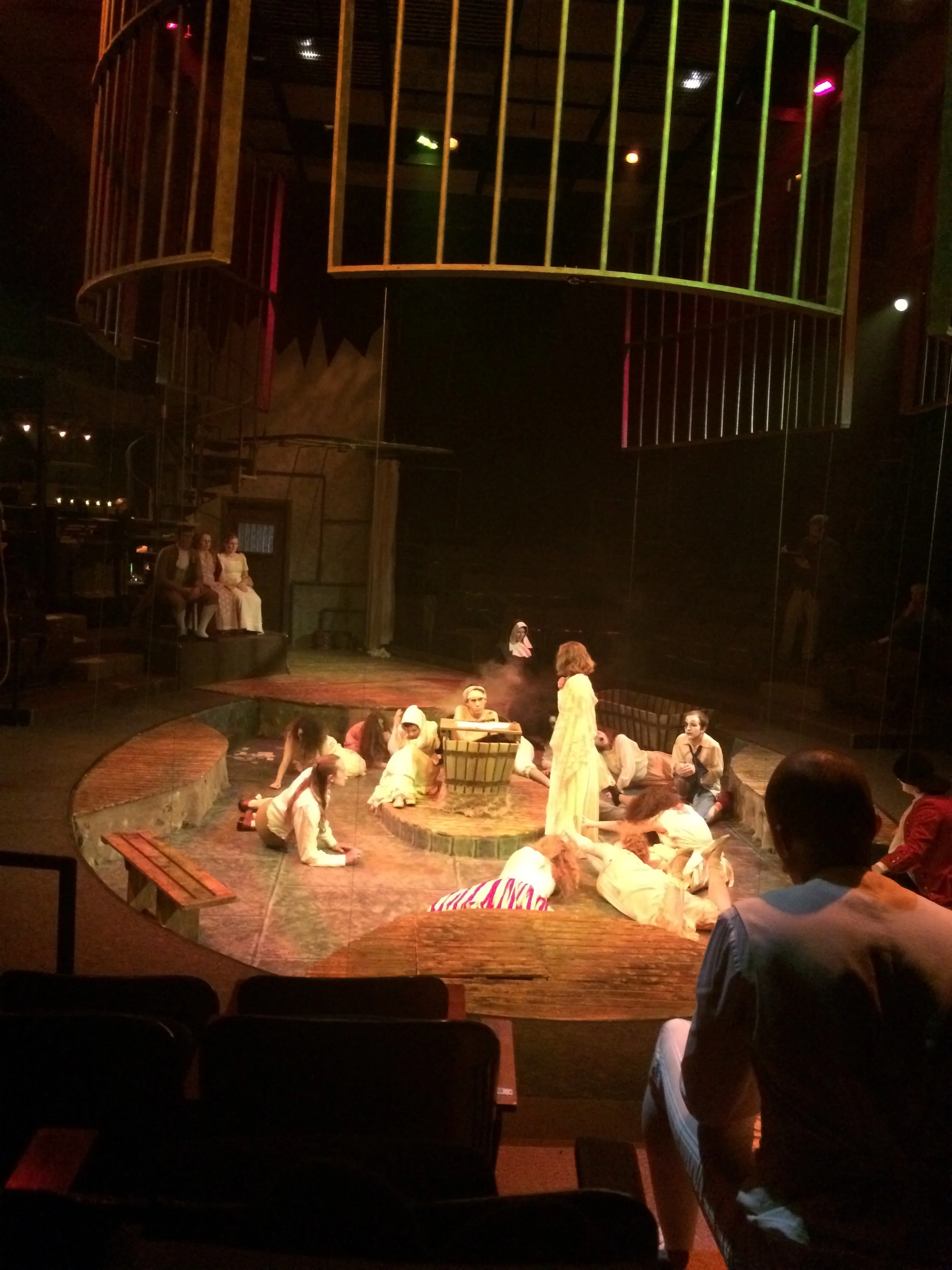  Cage bars surround the central playing area. These raise and lower at key moments in the play and hang suspended from the grid when not on the stage floor 