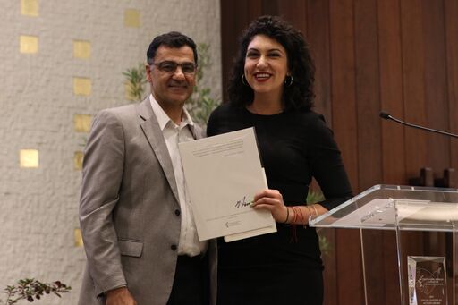 Salam Al-Marayati presents award to Social Justice Fellow Rachel Sumekh