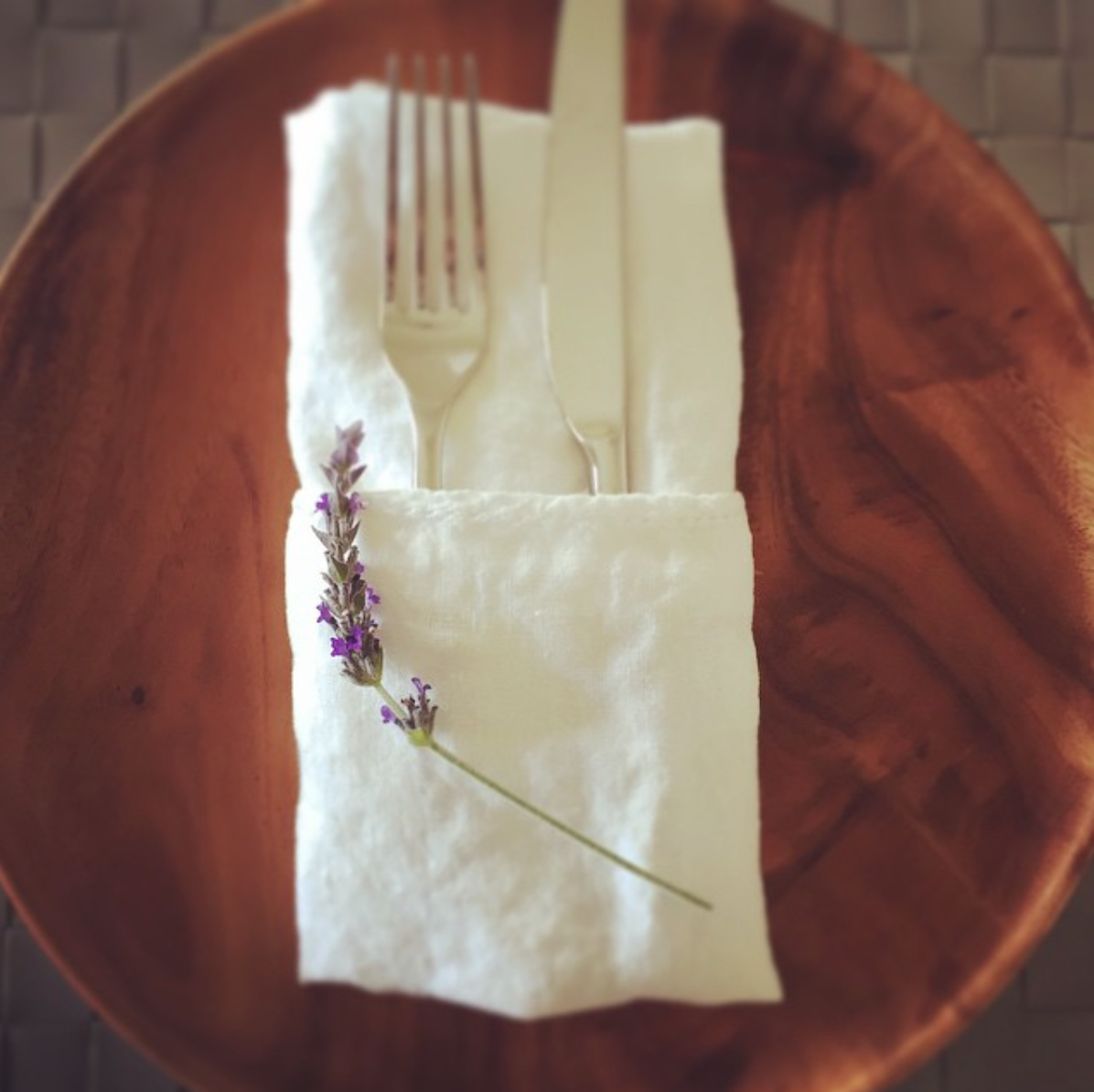 1. Table Settings - pocket fold your napkins and add an herb: sprig of rosemary, thyme, lavender for an added bonus.