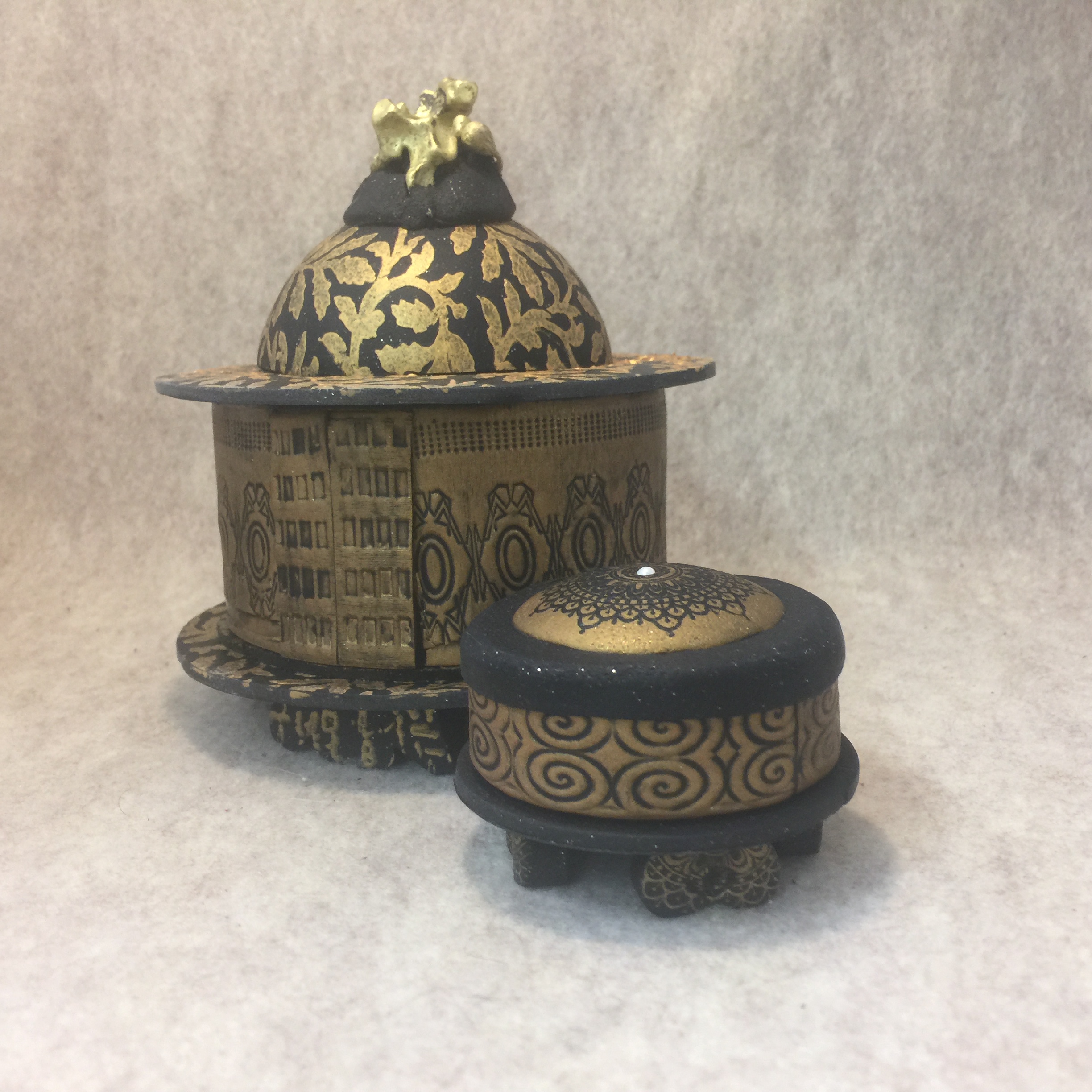 Evgenii Dvoretckii helped me cut the stamps that texture the sides of these boxe