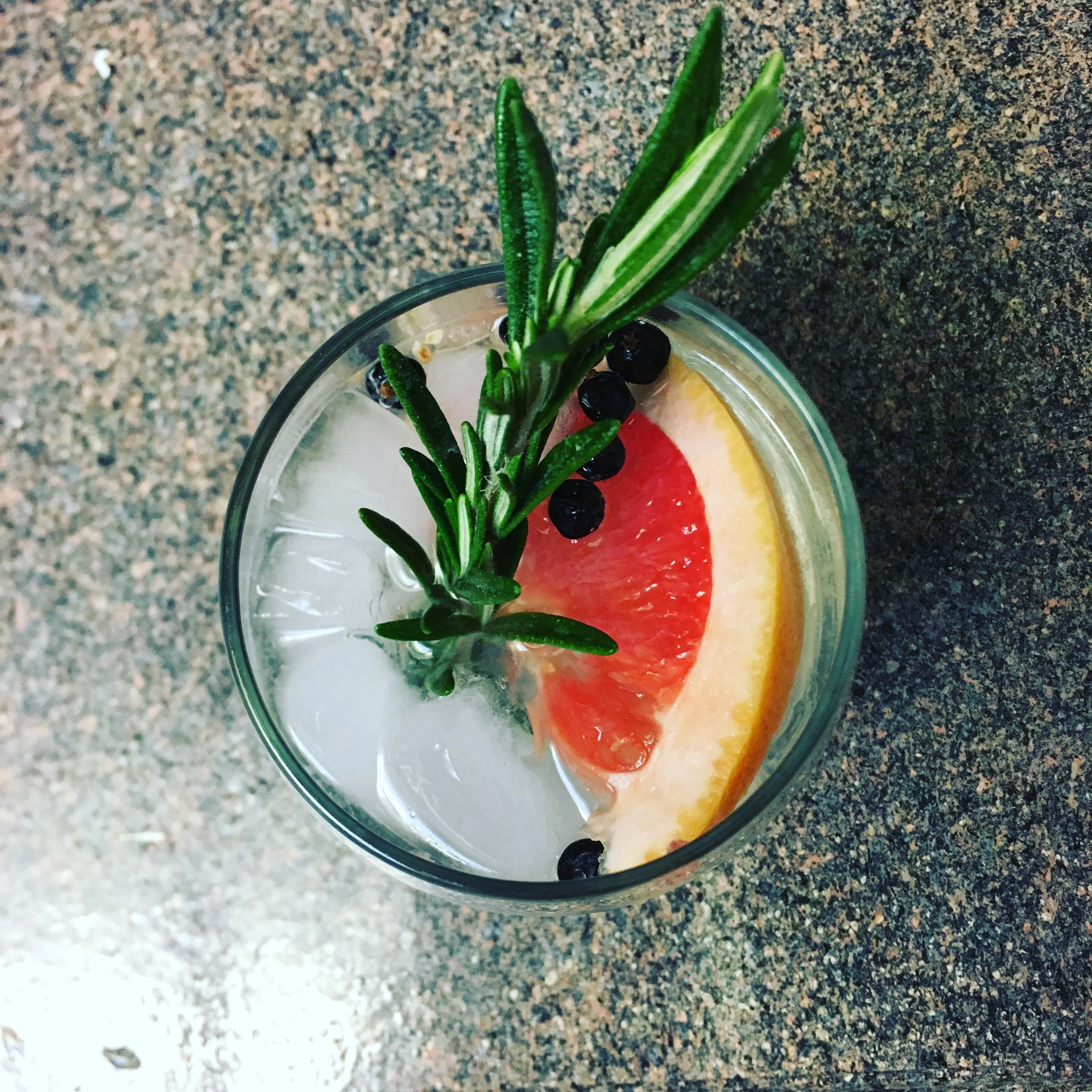 Elderflower Gin and Tonic with Juniper Berries, Grapefruit, and Rosemary