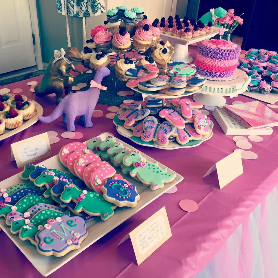 Pictured: custom sugar cookies with meringue royal icing, mini fresh-fruit cheesecakes, organic blueberry cupcakes with lemon cream cheese buttercream, Two Dolls chocolate cake, organic lemon zest cupcakes with fresh-whipped organic blackberry buttercream.