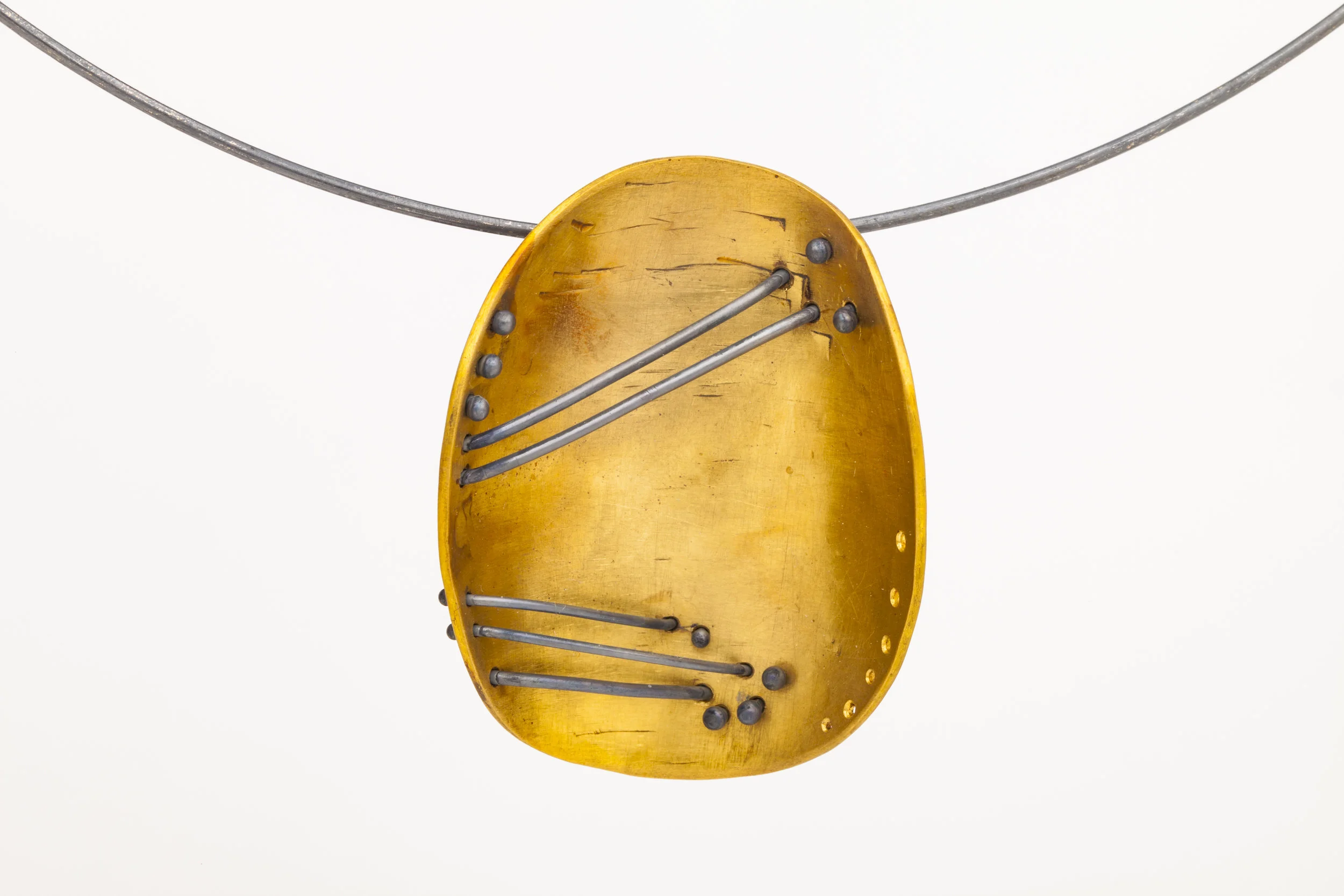 “Pelion,” second pendant in my “Pelagos (after Hepworth)” series. Pendant materials: 22k gold, oxidized sterling silver. About 1.5 inches long by 1 inches wide. 2019. Pelion is a peninsula in Greece combining the essence of mountains and sea.