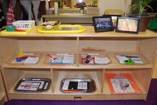 A TYPICAL SCIENCE SHELF IN A MONTESSORI ENVIRONMENT