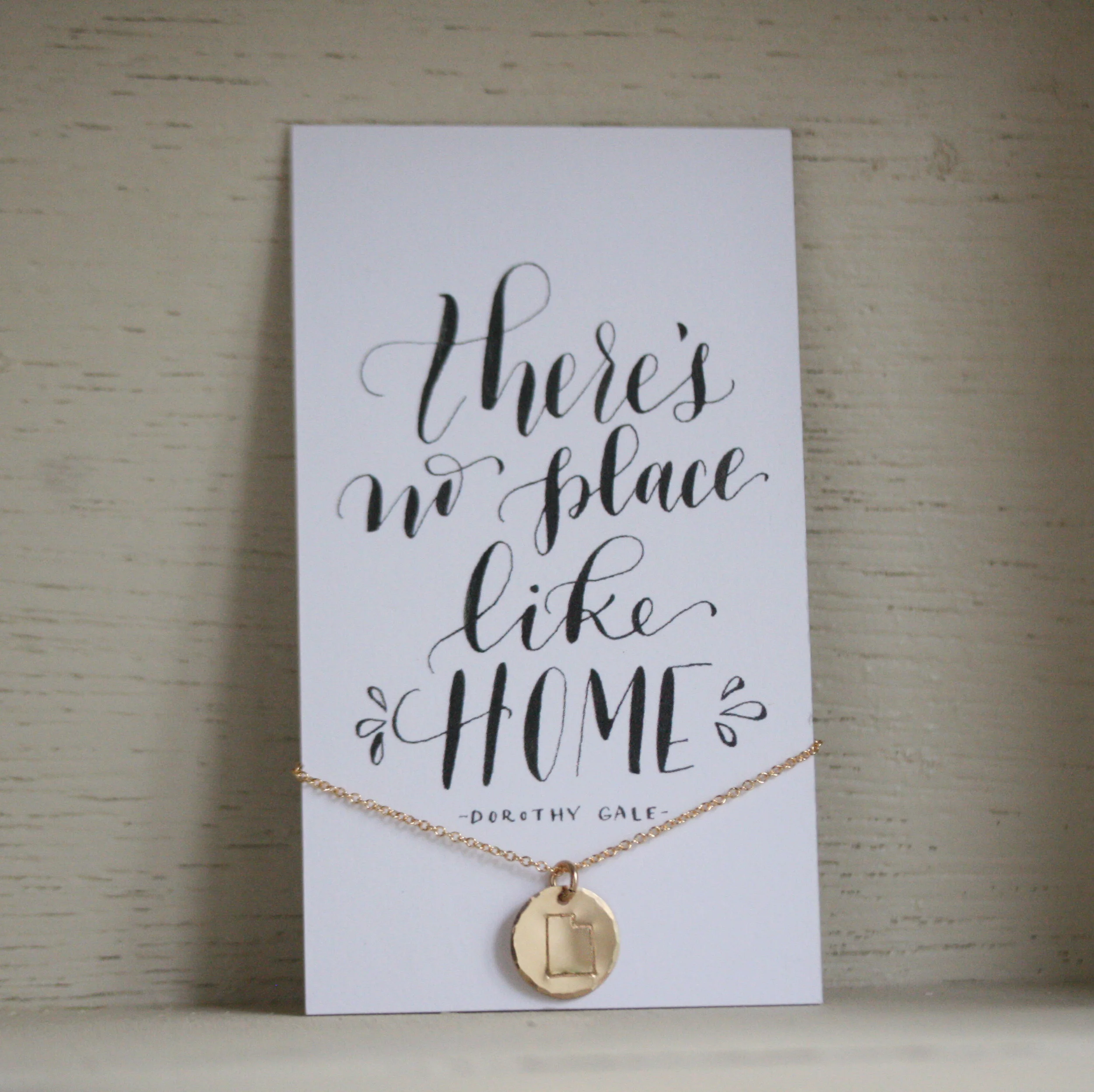 state_necklace_stamped_theres_no_place_like_home.jpg