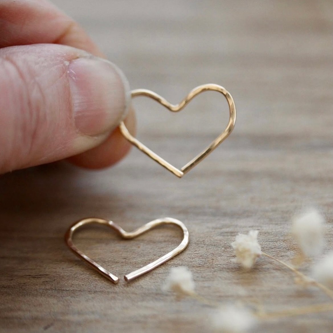 I&rsquo;m thrilled to share my Hidden Hearts Earrings are finally available online 💕🫶🏼🤍(and restocked in my brick and mortar shop @honeylily.boutique🫶🏼). I have three sets ready to ship TODAY for those who&rsquo;d like them mailed to you in tim