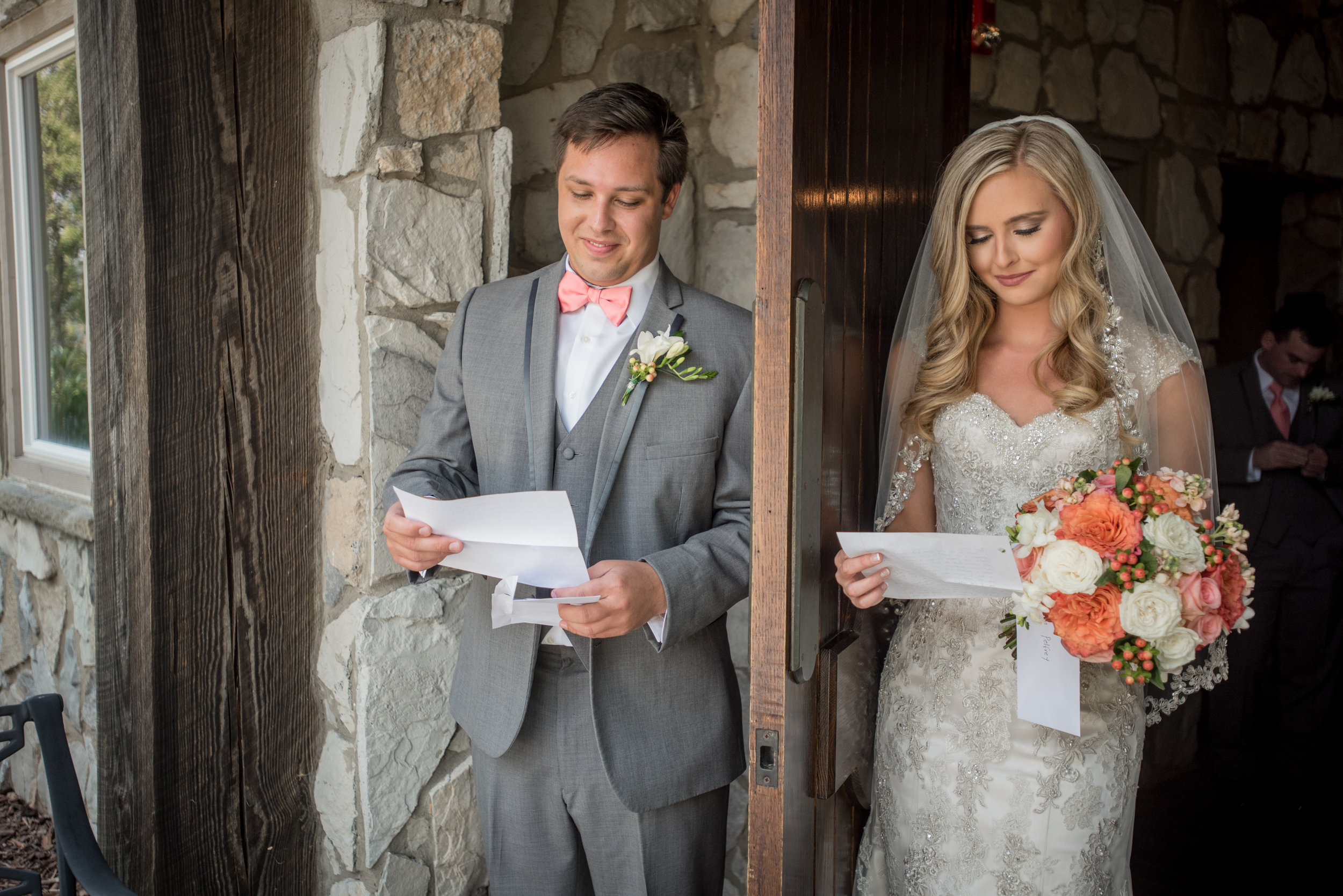 Instead of a first look, Leah & Alex chose to read letters from each other while standing on opposite sides of a door. This allowed Todd from Magnolia Studios to capture an intimate moment with the couple without them seeing one another before the ceremony. 