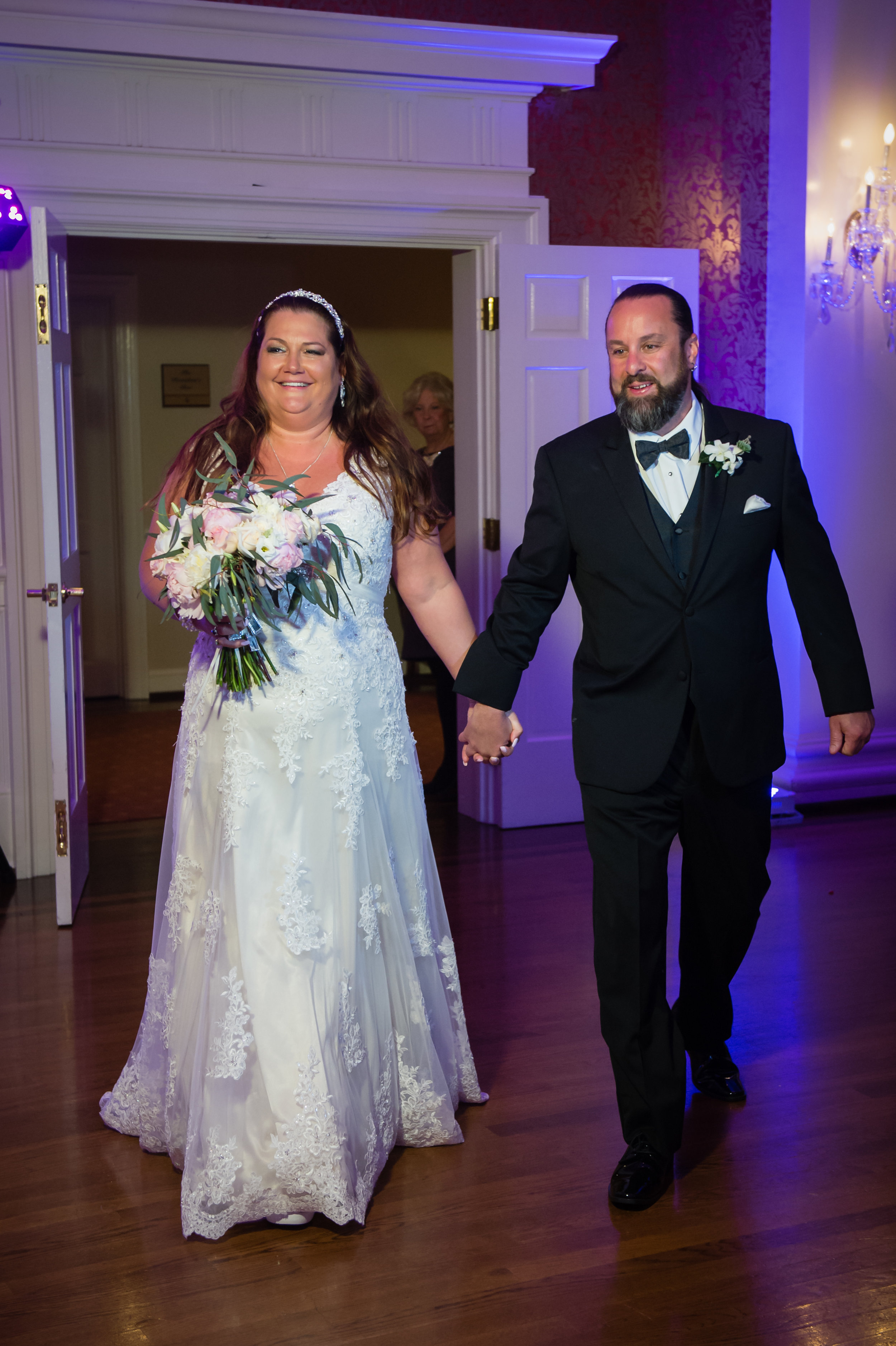 Kim & Mark made their grand entrance into the color-filled room and began their long awaited first dance as husband & wife. They chose the classic "You're My Home" by Billy Joel.