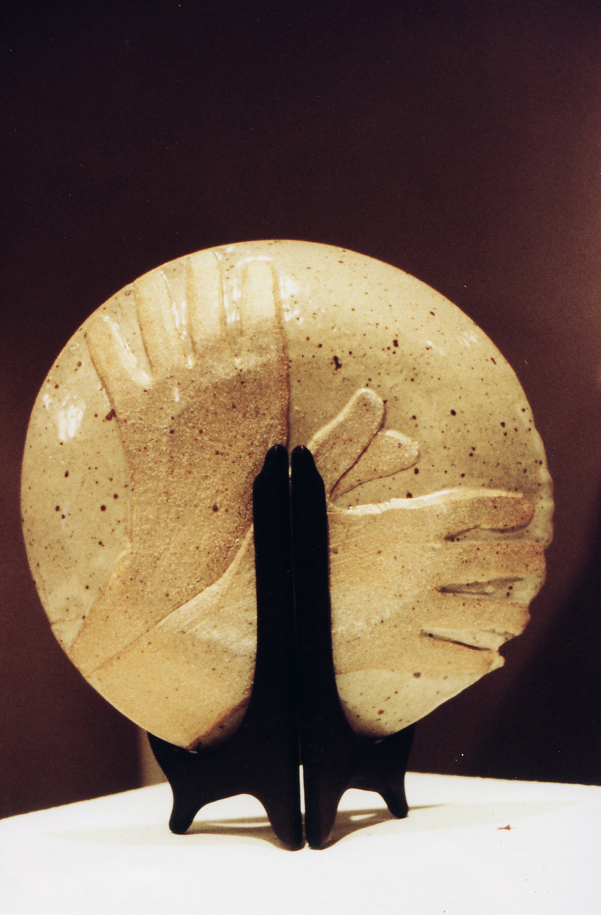 Winged hands plate.jpg