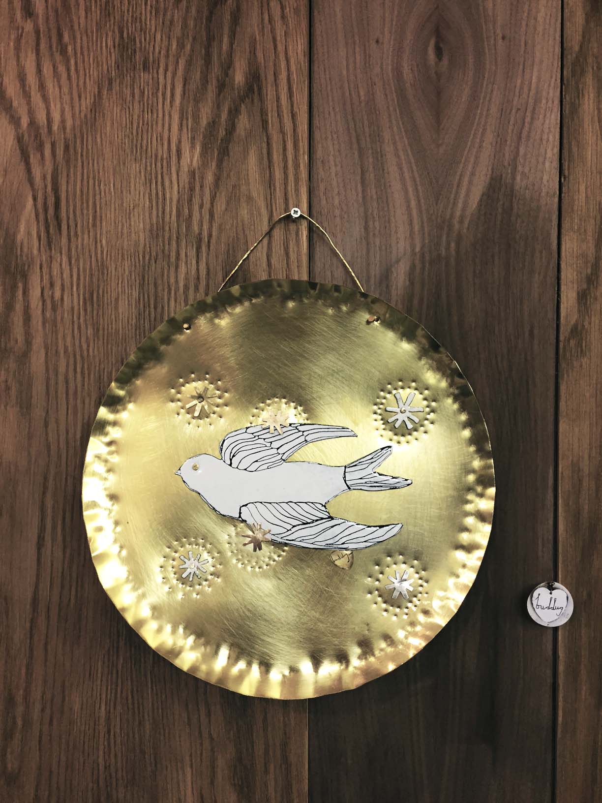 The final piece hung up in my studio show space (I've wire brushed the plate and varnished)