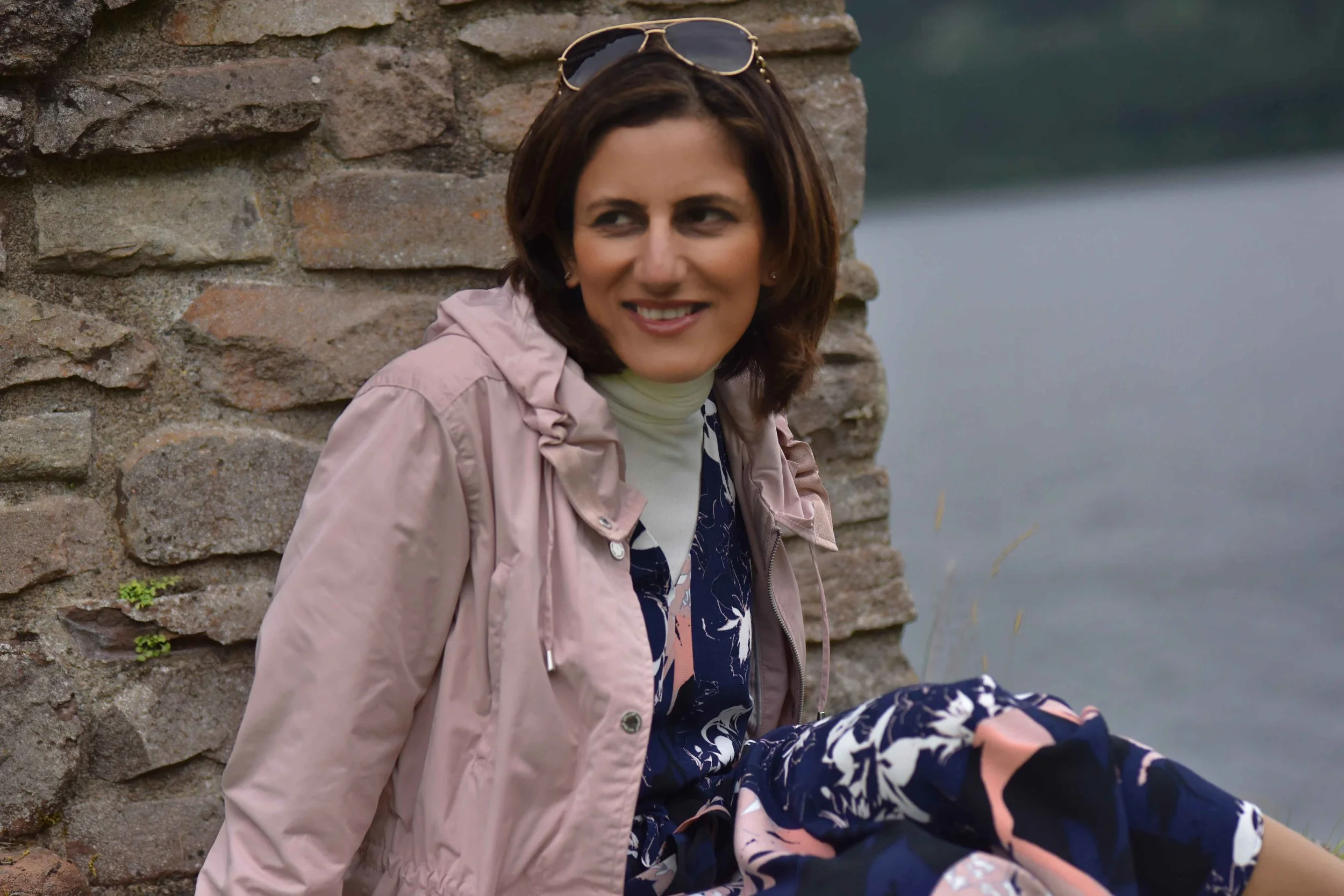 Pink Stormwear M&S jacket, printed maxi dress, Urquhart Castle, Loch Ness, Scotland. Image©thingstodot.com